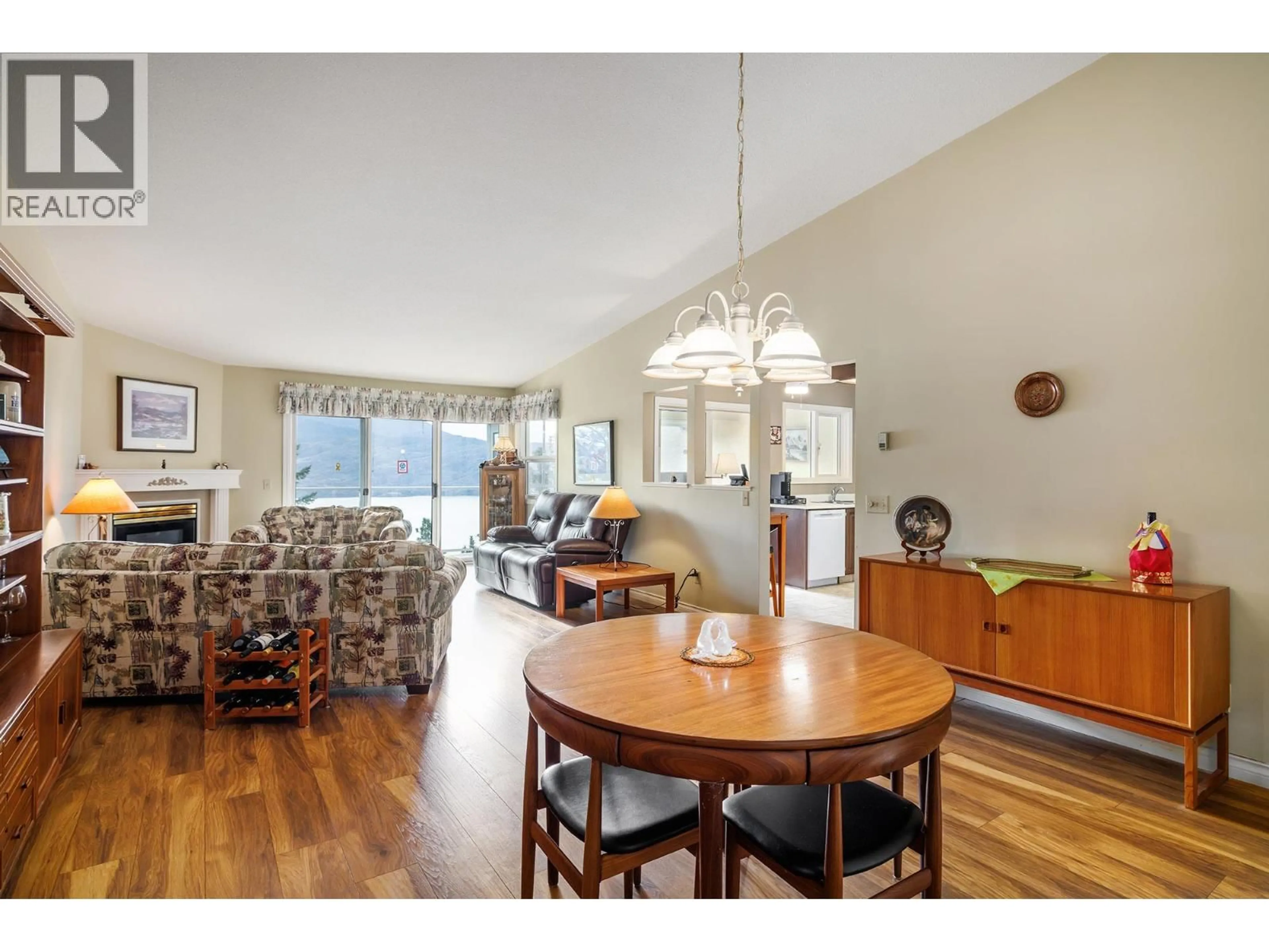 Dining room, wood/laminate floor for 202 - 4450 PONDEROSA DRIVE, Peachland British Columbia V0H1X5