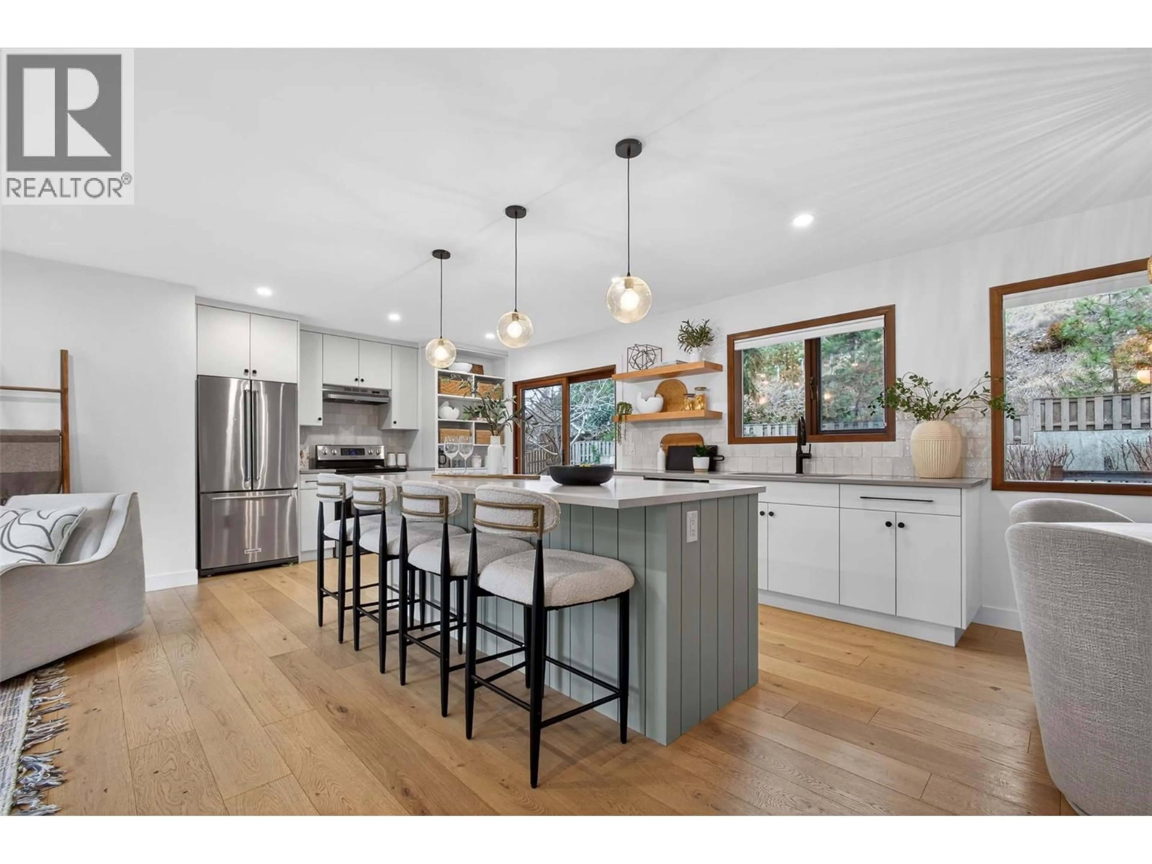 Open concept kitchen, wood/laminate floor for 1812 OLYMPUS WAY, West Kelowna British Columbia V1Z3H9