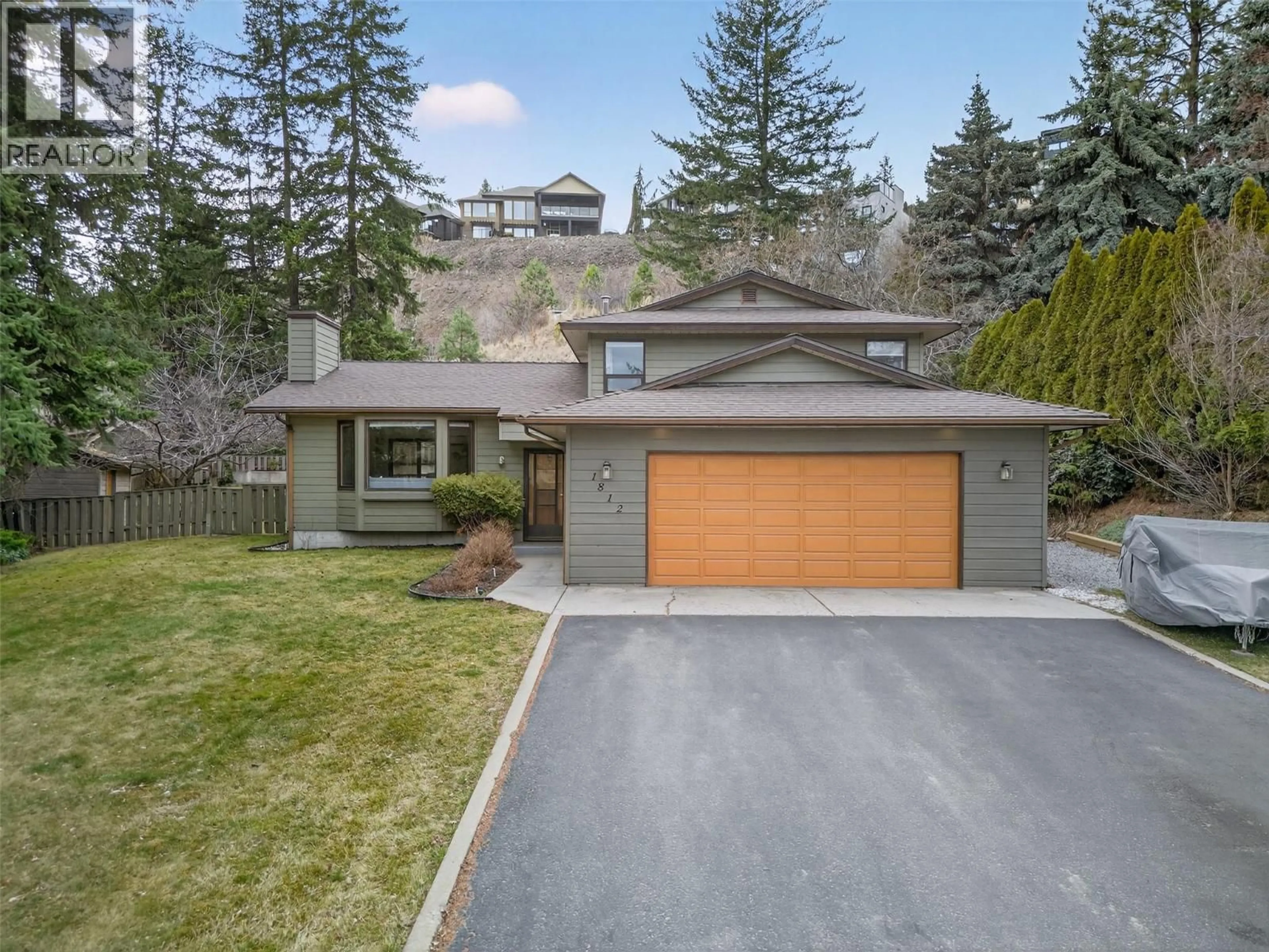 Home with vinyl exterior material, street for 1812 OLYMPUS WAY, West Kelowna British Columbia V1Z3H9