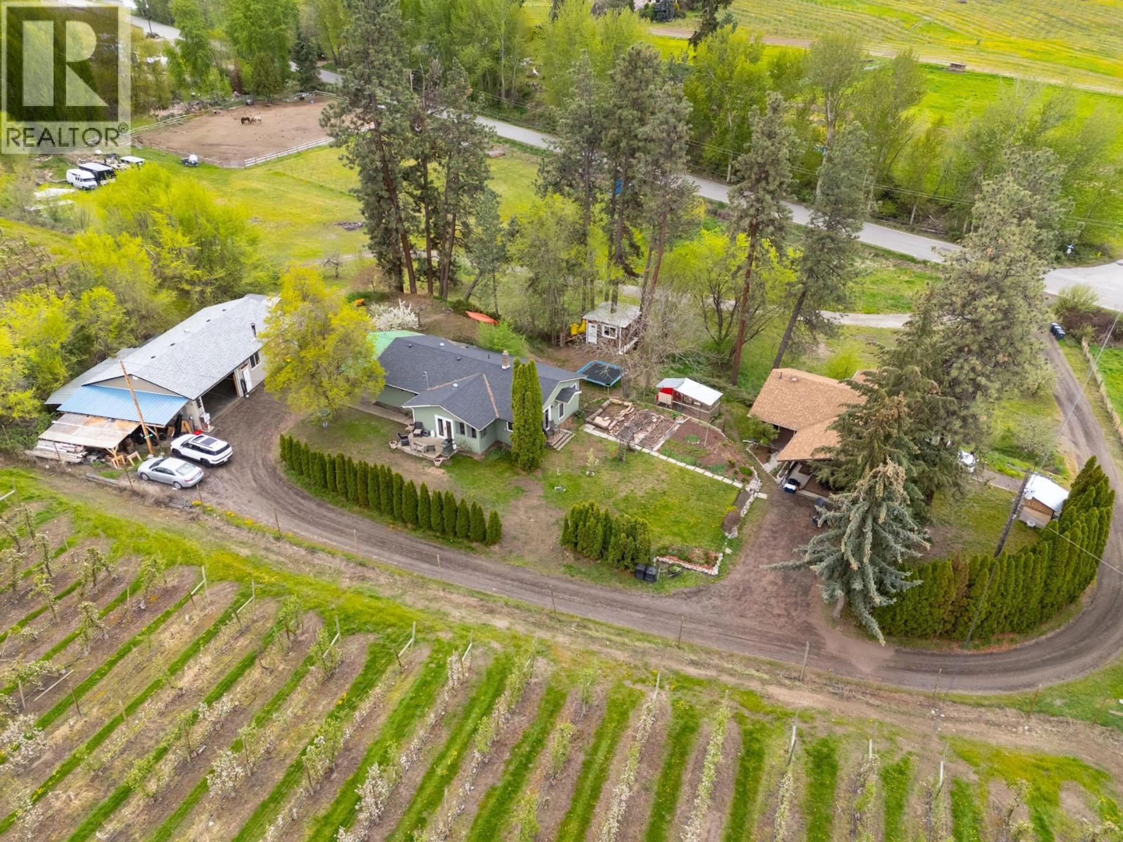 A pic from outside/outdoor area/front of a property/back of a property/a pic from drone, unknown for 3060 GULLEY ROAD, Kelowna British Columbia V1W4E5