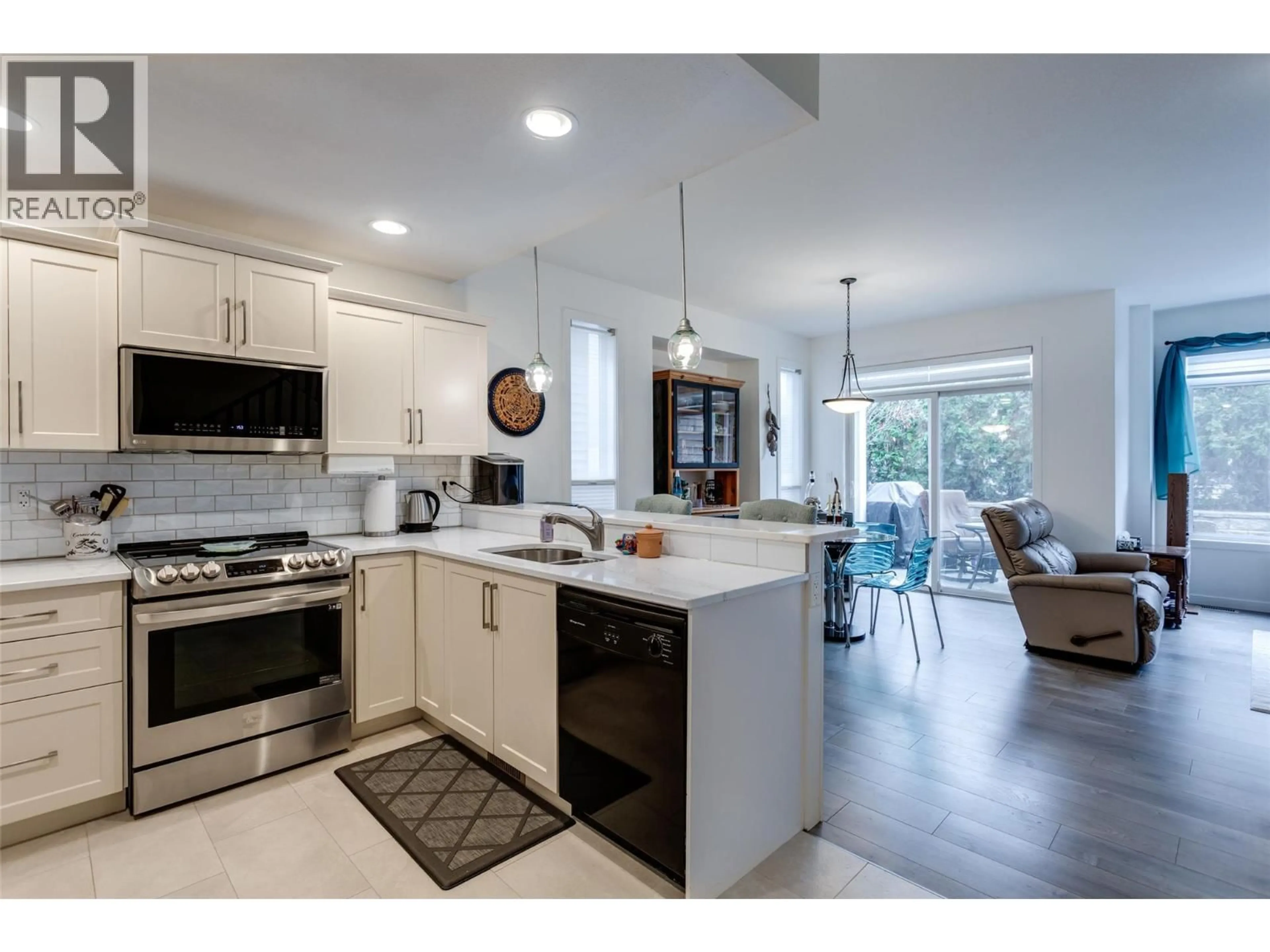 Open concept kitchen, ceramic/tile floor for 42 - 100 PALMER ROAD, Vernon British Columbia V1H2H8