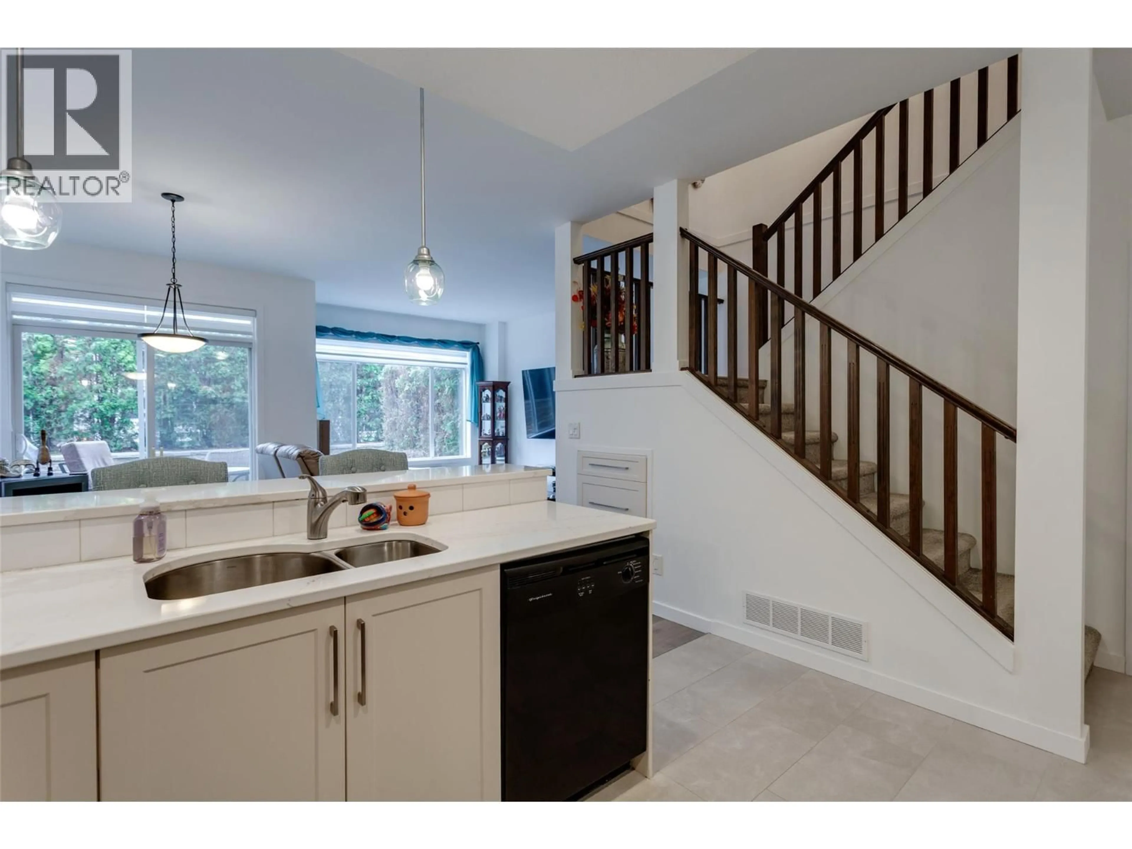 Open concept kitchen, ceramic/tile floor for 42 - 100 PALMER ROAD, Vernon British Columbia V1H2H8