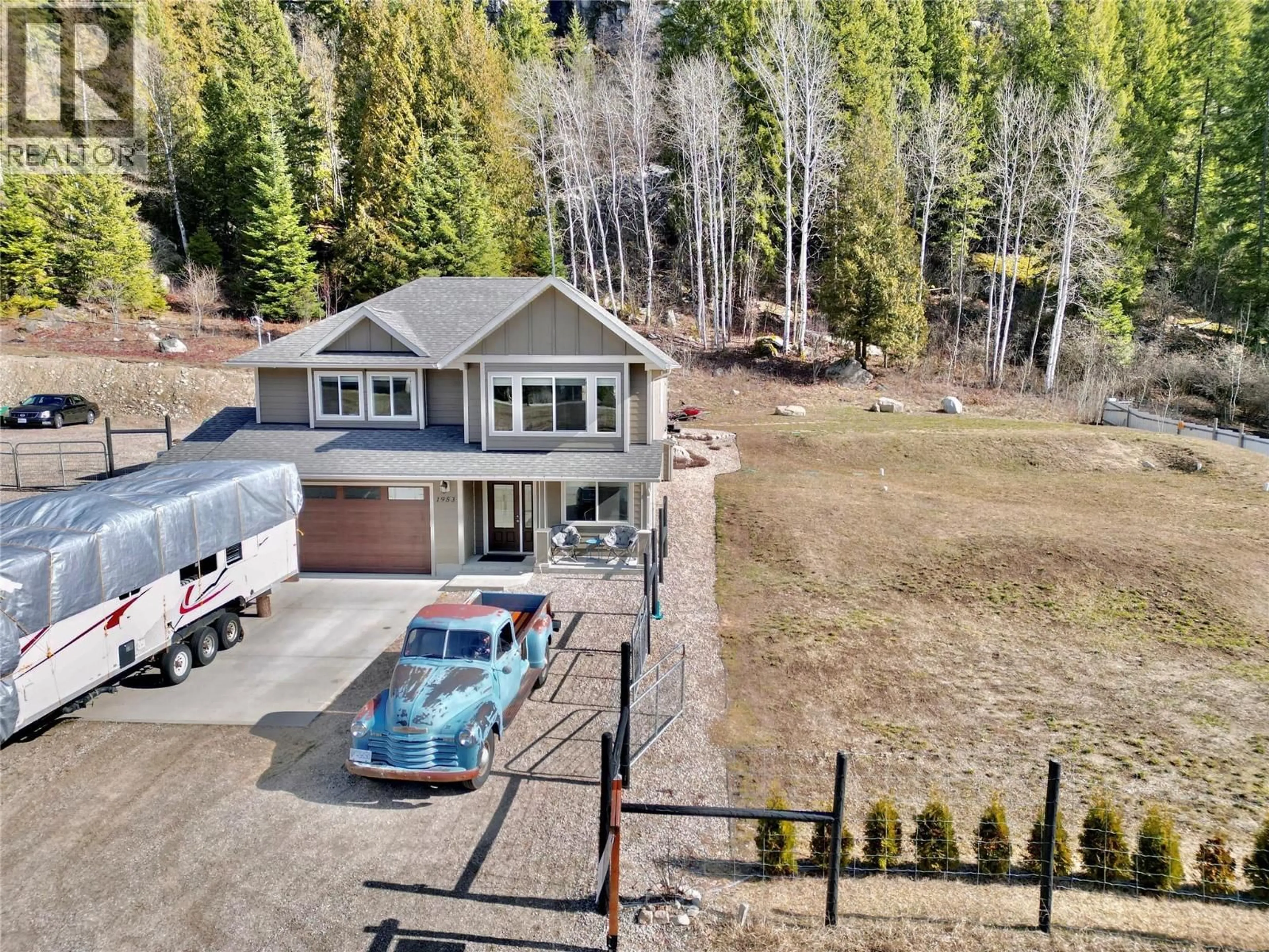 A pic from outside/outdoor area/front of a property/back of a property/a pic from drone, unknown for 1953 SANDY ROAD, Castlegar British Columbia V1N4T1