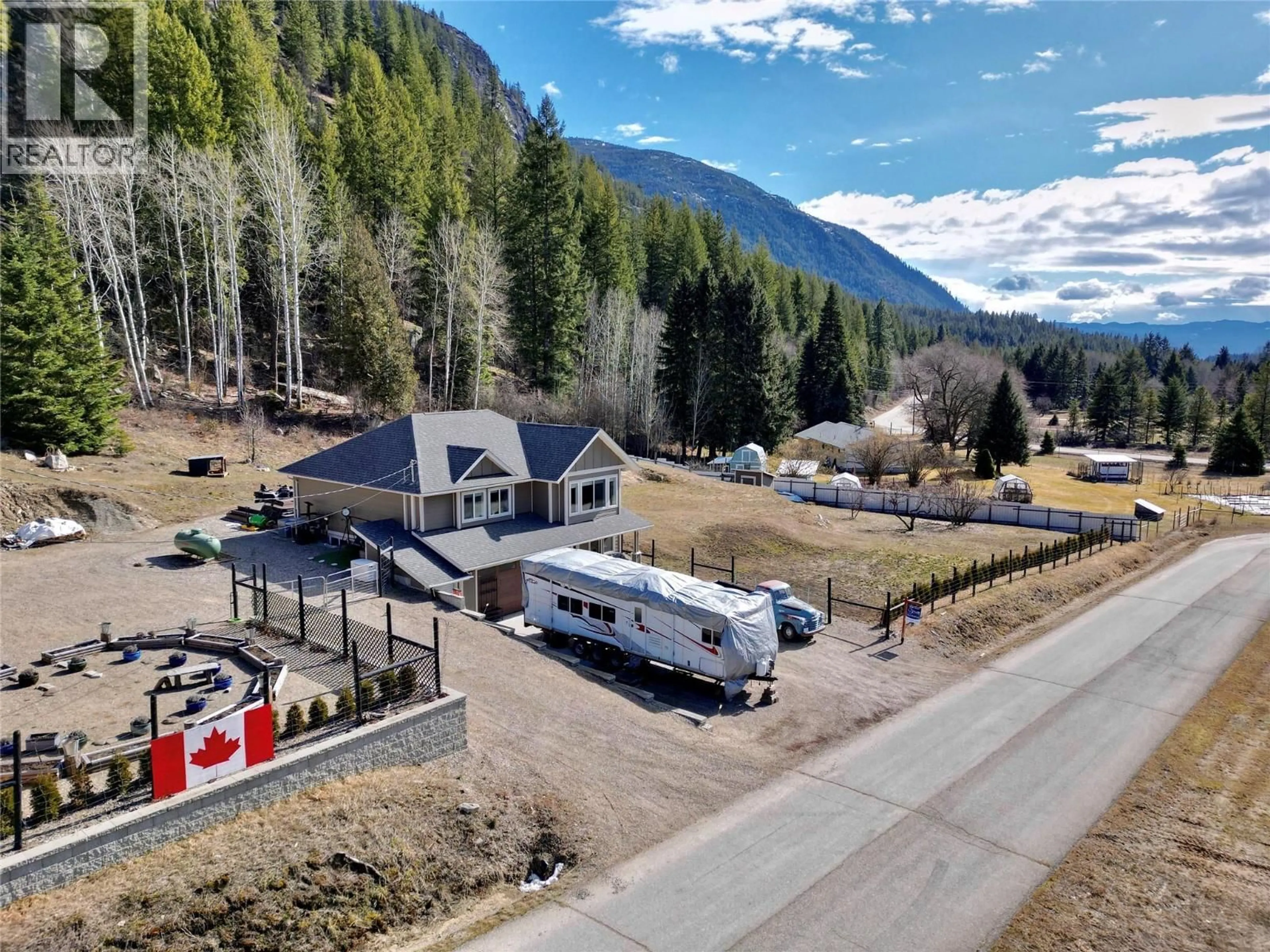 A pic from outside/outdoor area/front of a property/back of a property/a pic from drone, mountain view for 1953 SANDY ROAD, Castlegar British Columbia V1N4T1