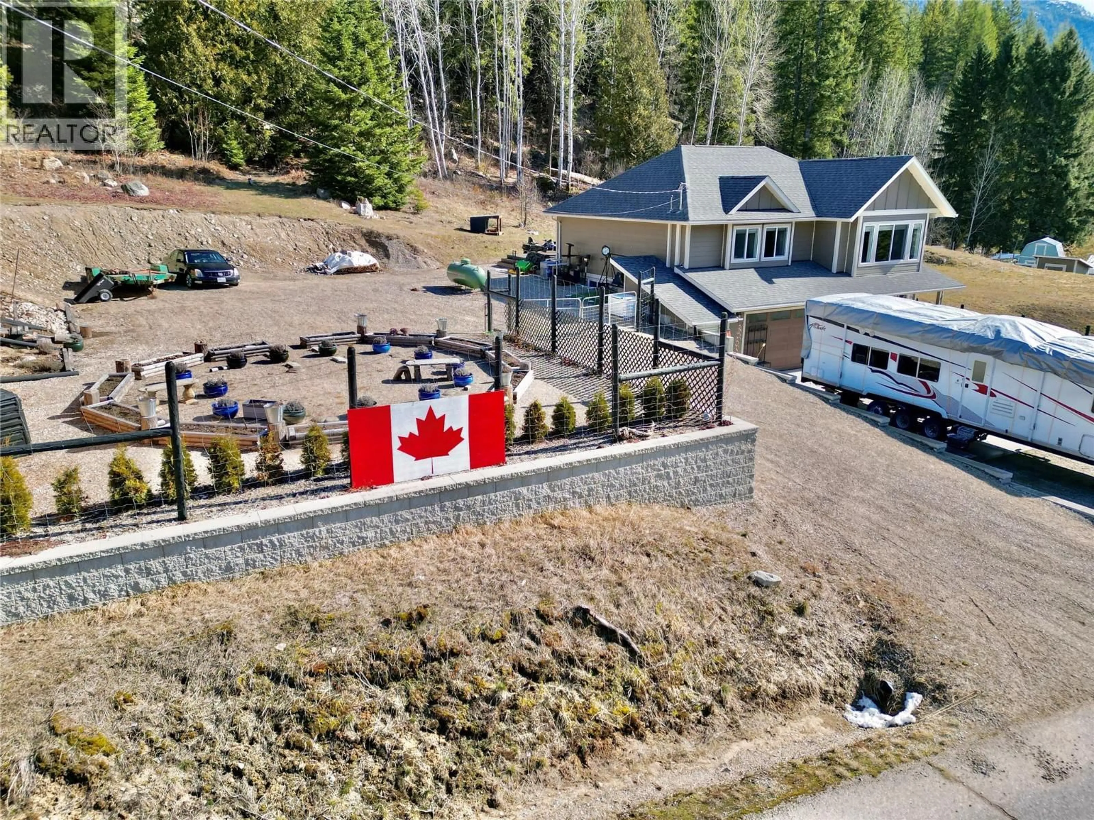 A pic from outside/outdoor area/front of a property/back of a property/a pic from drone, mountain view for 1953 SANDY ROAD, Castlegar British Columbia V1N4T1
