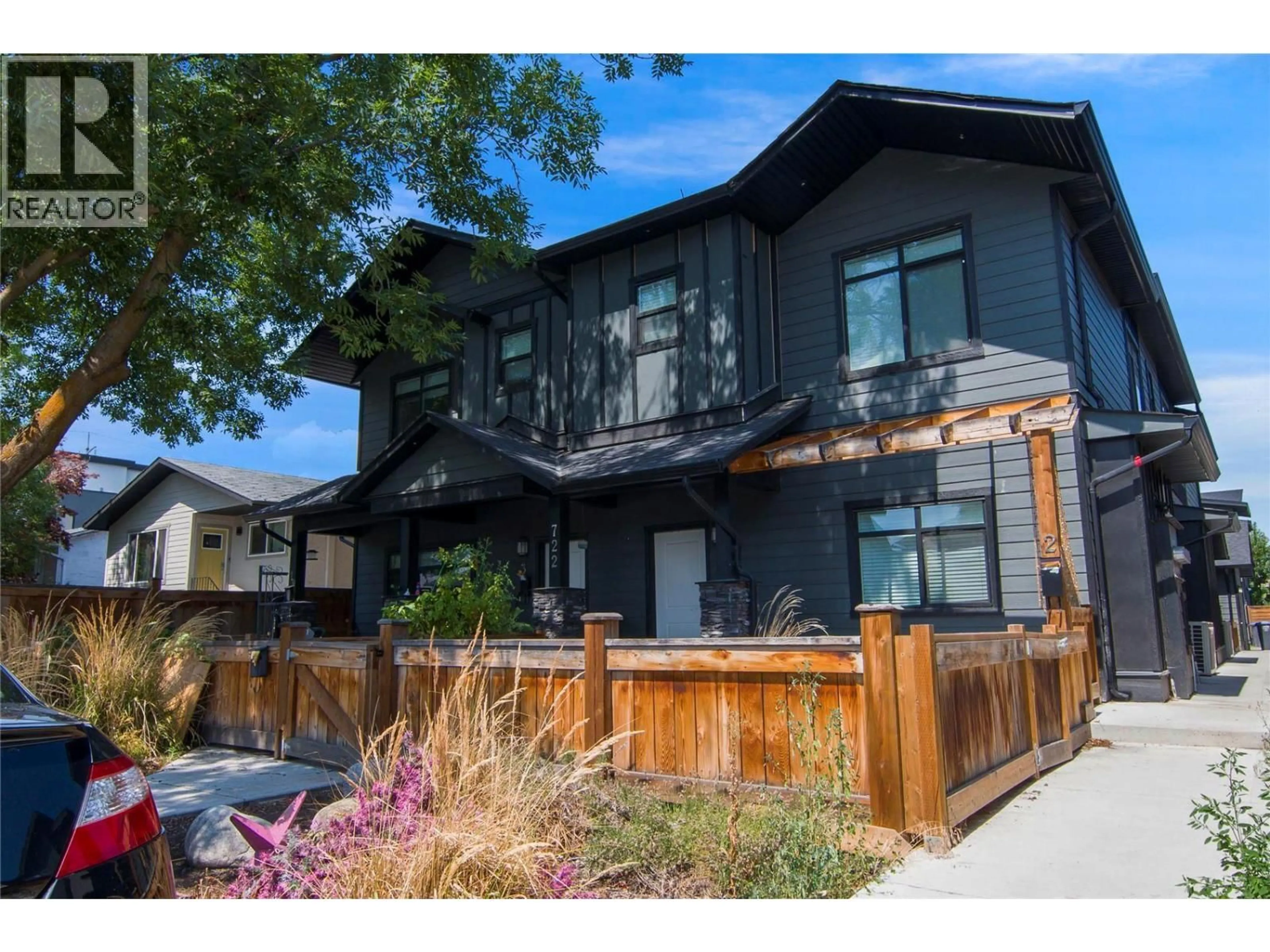 Home with brick exterior material, street for 2 - 722 COOPLAND CRESCENT, Kelowna British Columbia V1Y2V1