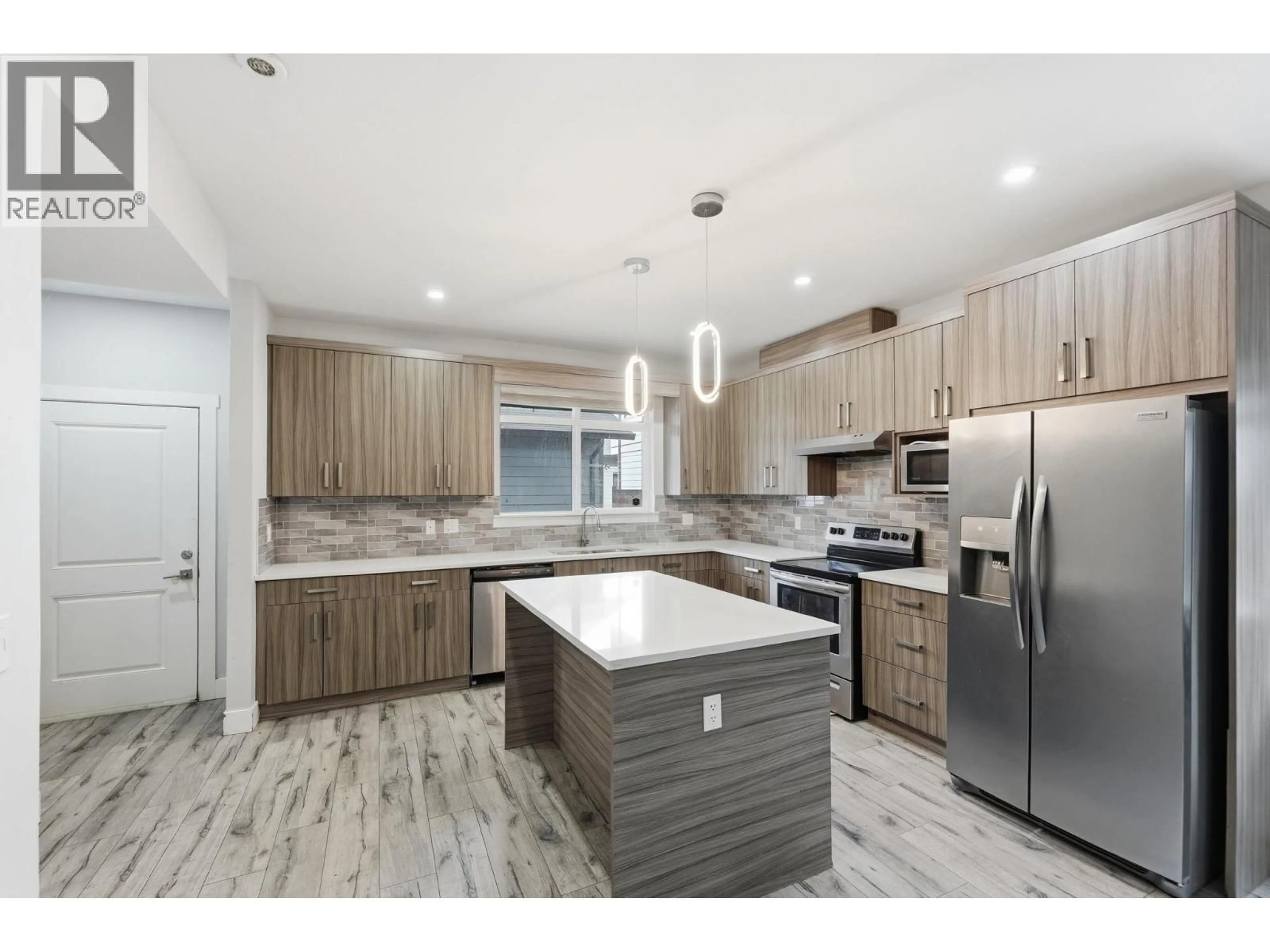 Open concept kitchen, unknown for 2 - 722 COOPLAND CRESCENT, Kelowna British Columbia V1Y2V1