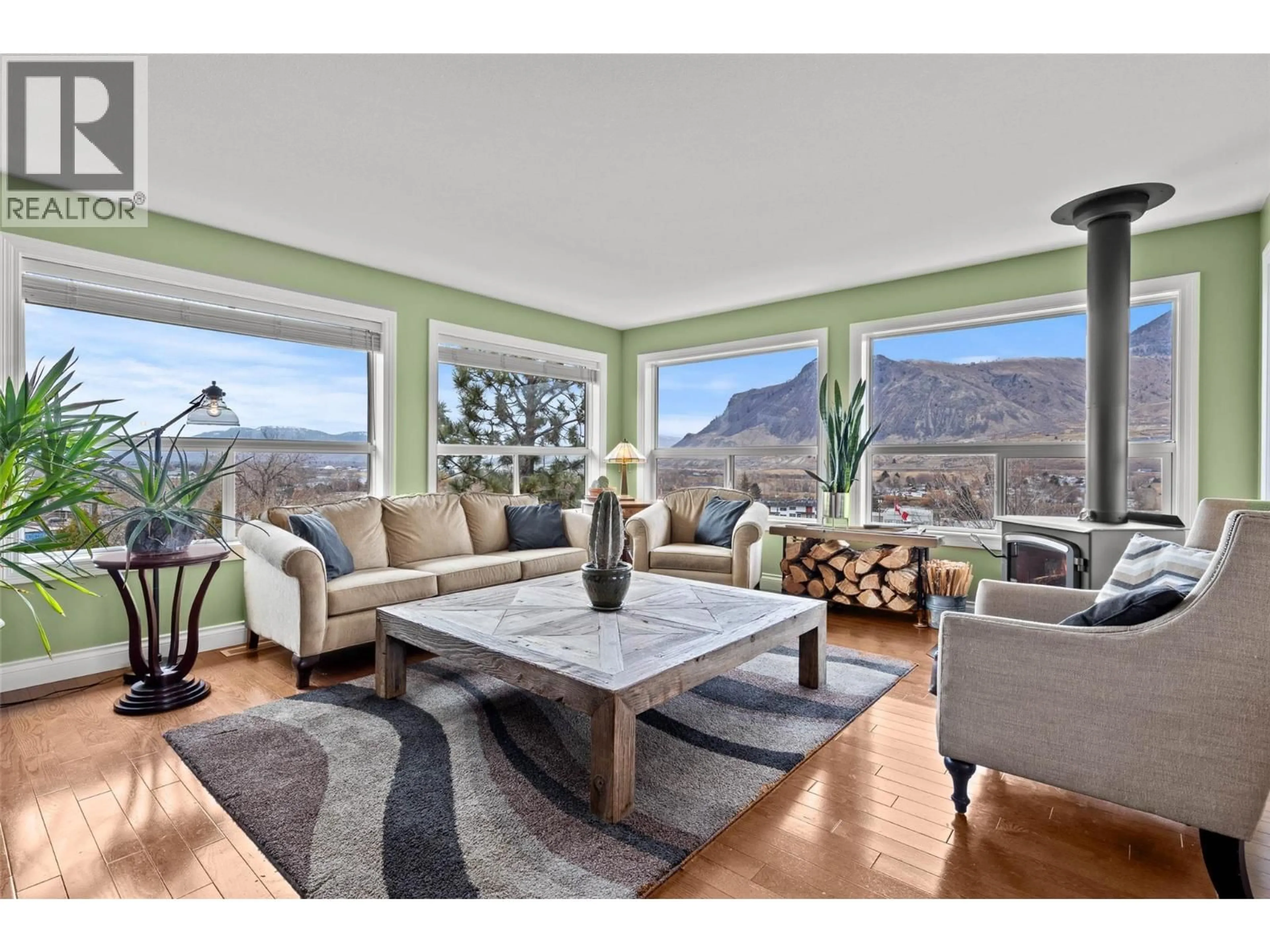 Living room with furniture, wood/laminate floor for 1491 PINE CRESCENT, Kamloops British Columbia V2C2Z4