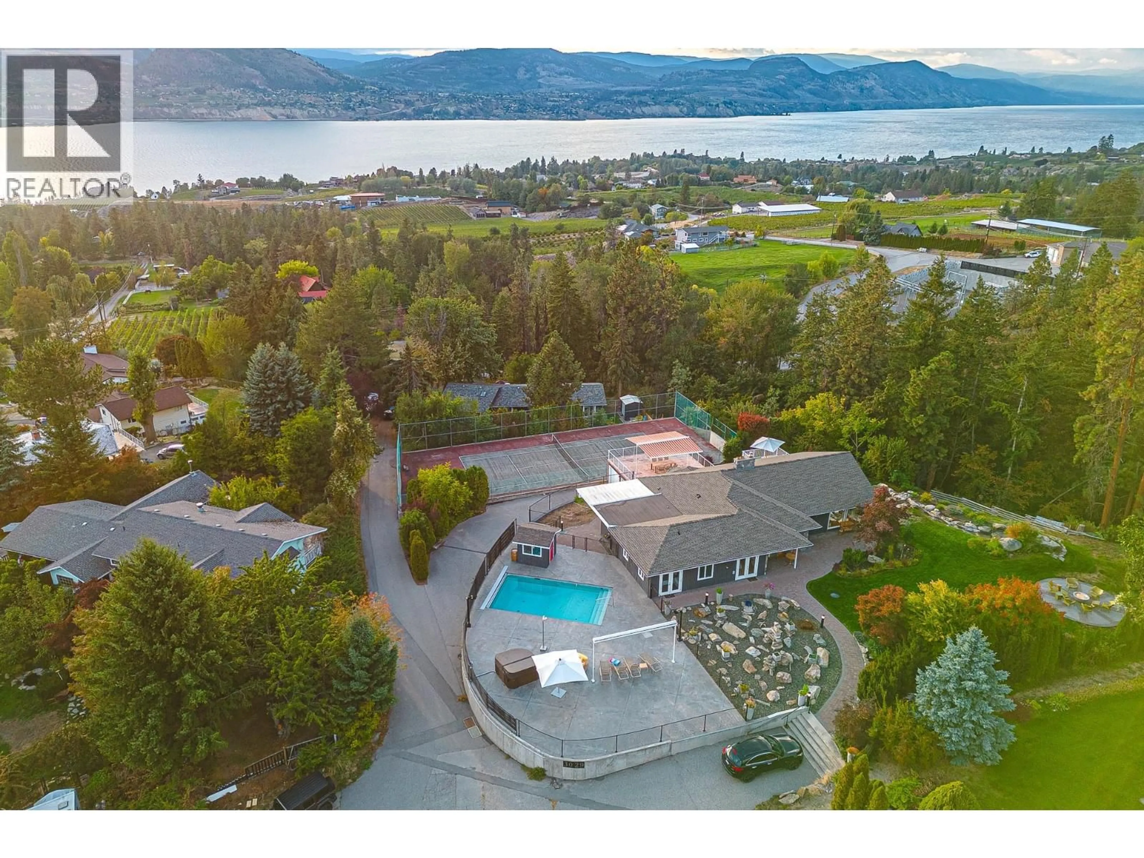 A pic from outside/outdoor area/front of a property/back of a property/a pic from drone, water/lake/river/ocean view for 3029 SPRUCE DRIVE, Naramata British Columbia V0H1N0