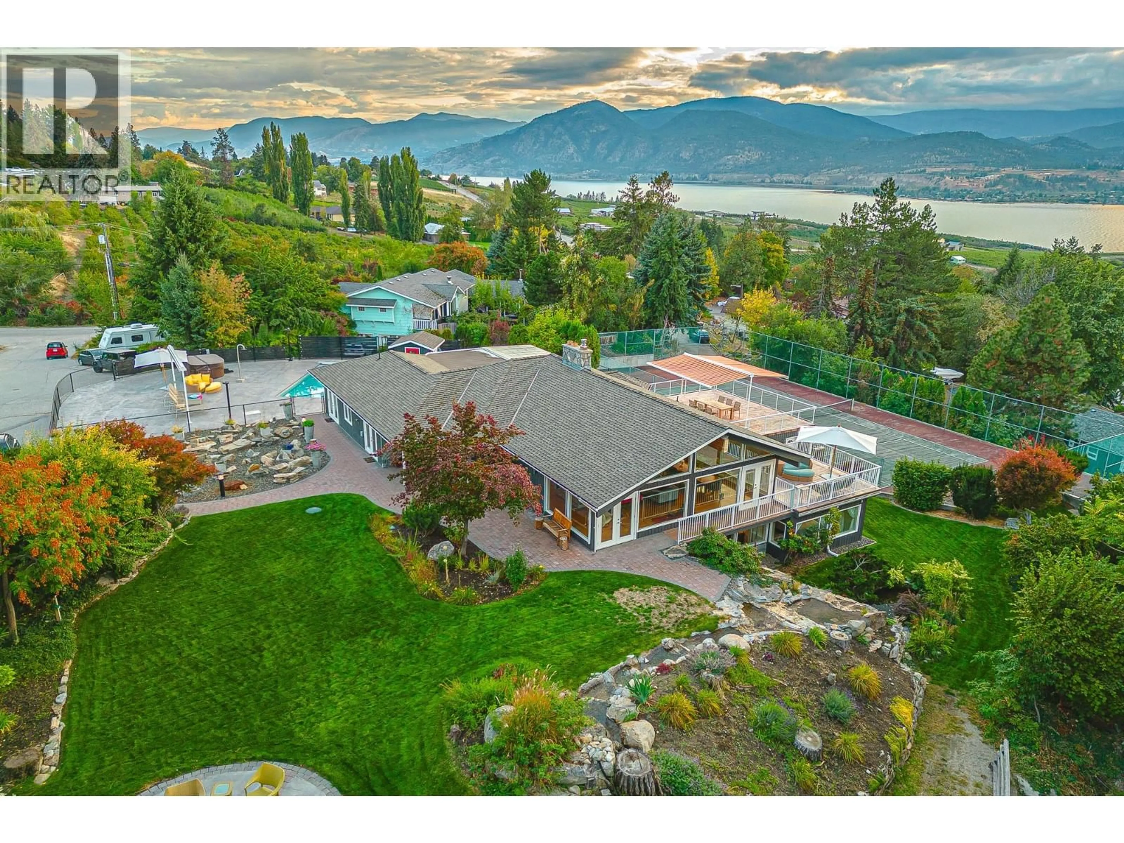 A pic from outside/outdoor area/front of a property/back of a property/a pic from drone, water/lake/river/ocean view for 3029 SPRUCE DRIVE, Naramata British Columbia V0H1N0