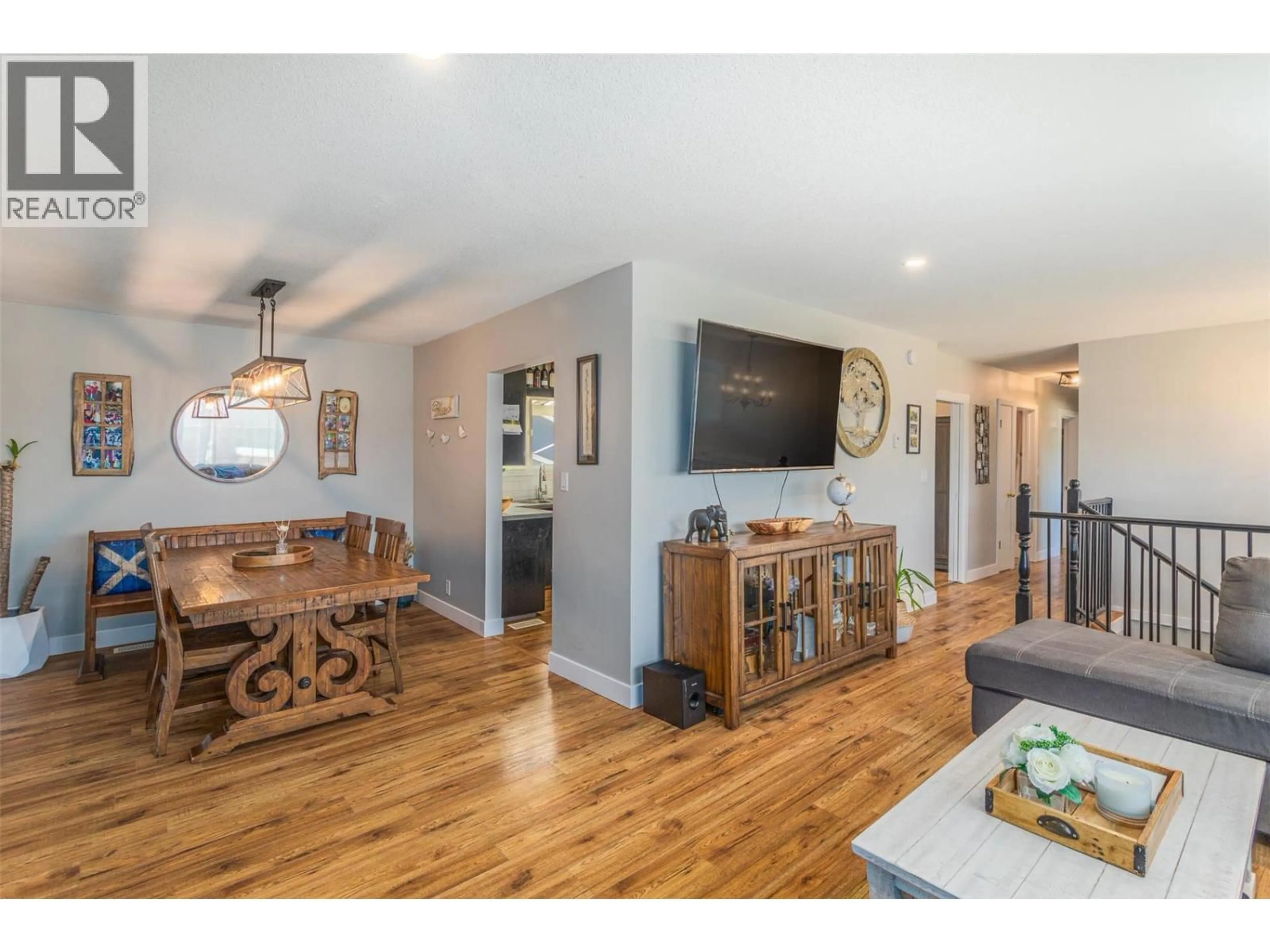 Open concept kitchen, wood/laminate floor for 3339 BOTHE ROAD, Kelowna British Columbia V1W3M3