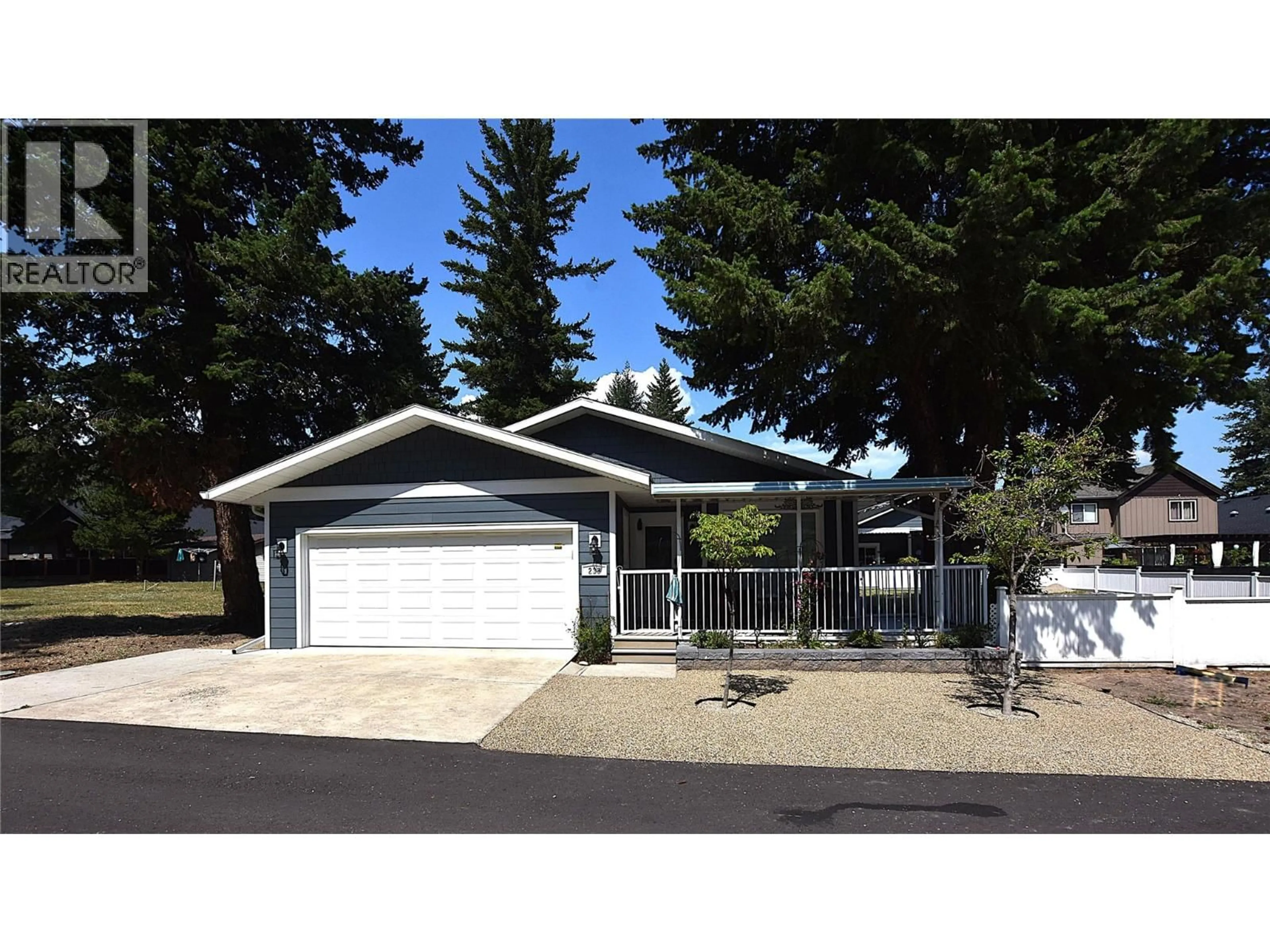 Home with vinyl exterior material, street for 233 234 FALCON AVENUE, Vernon British Columbia V1H2A1
