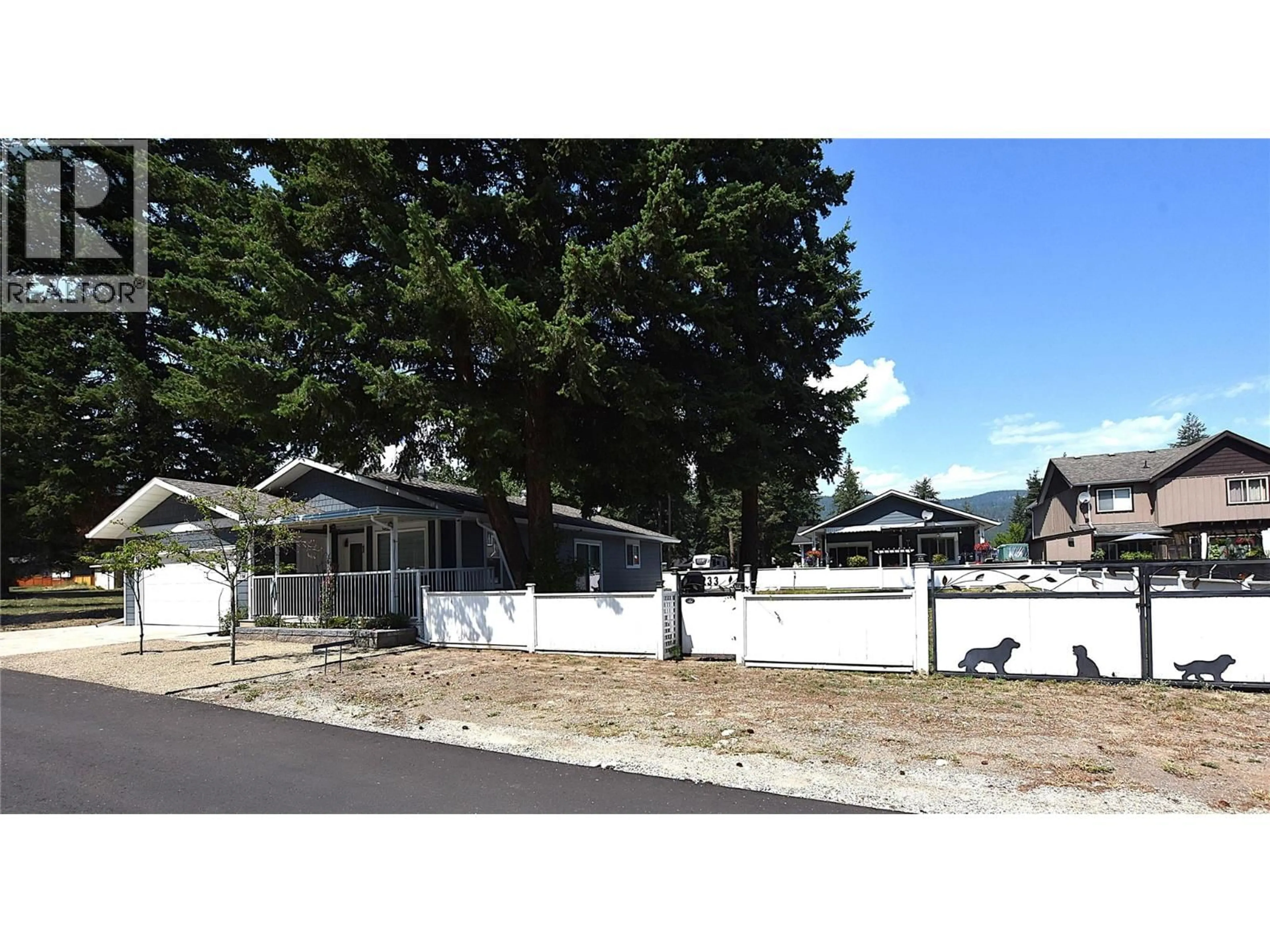 A pic from outside/outdoor area/front of a property/back of a property/a pic from drone, street for 233 234 FALCON AVENUE, Vernon British Columbia V1H2A1