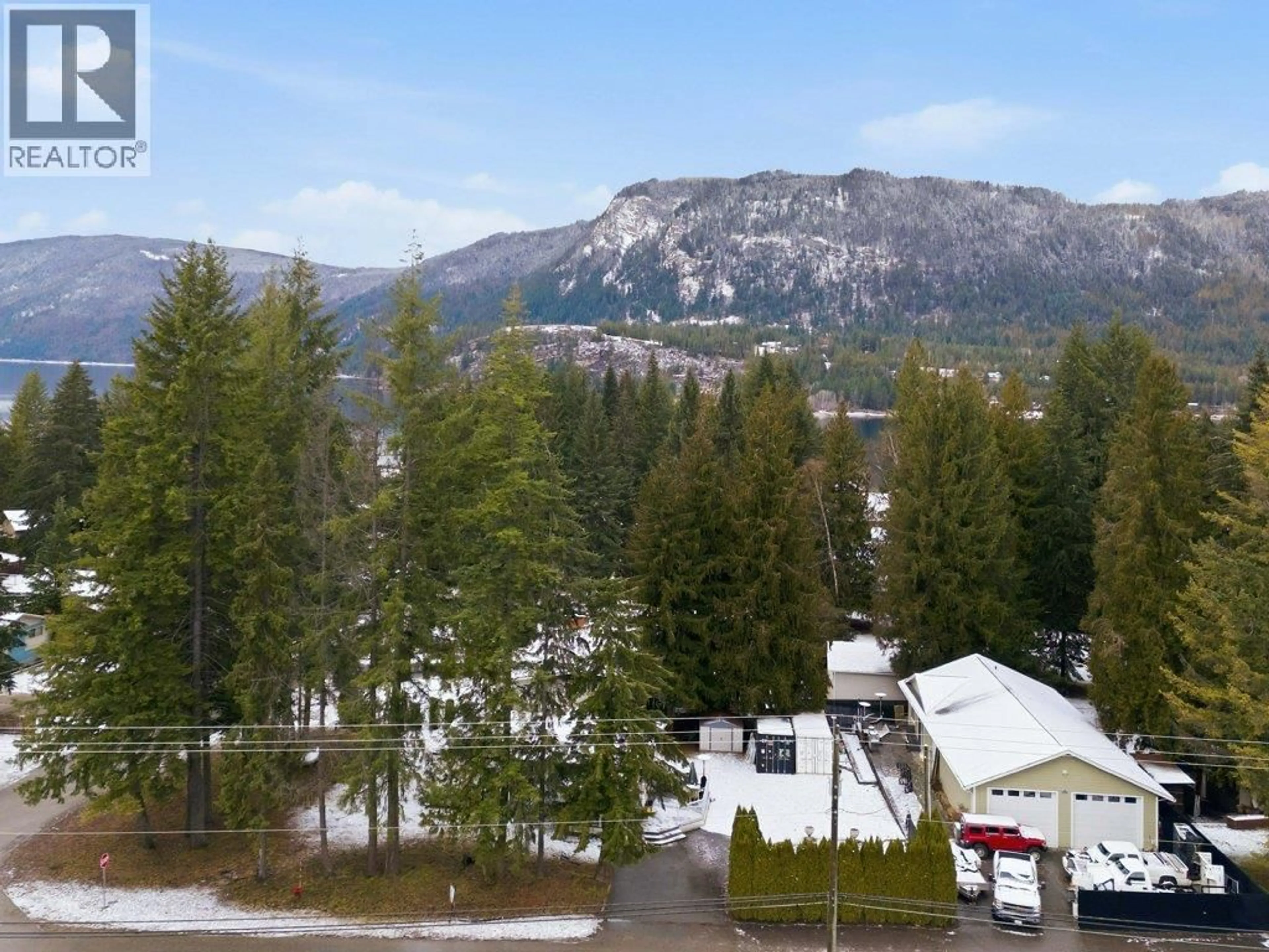 A pic from outside/outdoor area/front of a property/back of a property/a pic from drone, mountain view for 1 WOLFE STREET, Sicamous British Columbia V0E2V1