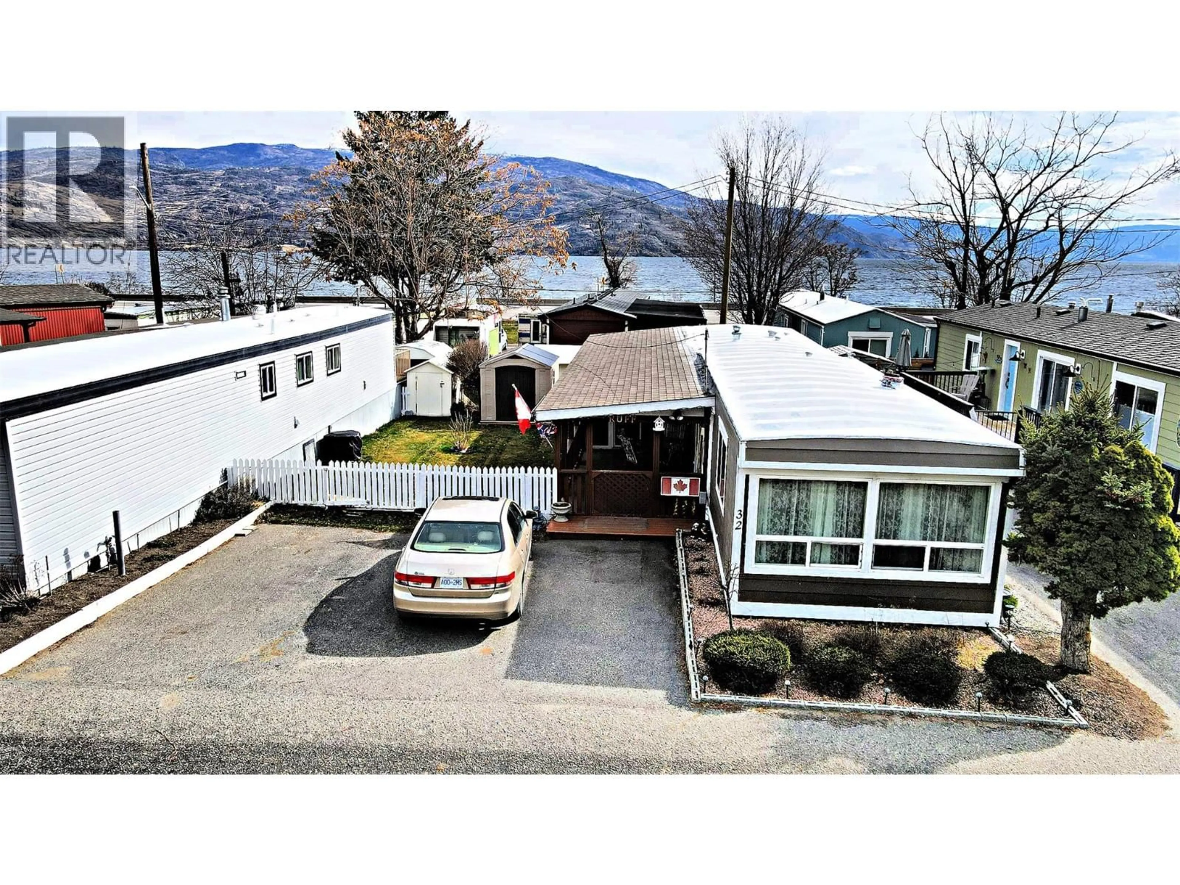 A pic from outside/outdoor area/front of a property/back of a property/a pic from drone, mountain view for 32 - 6663 HWY 97 OTHER SOUTH, Peachland British Columbia V0H1X7