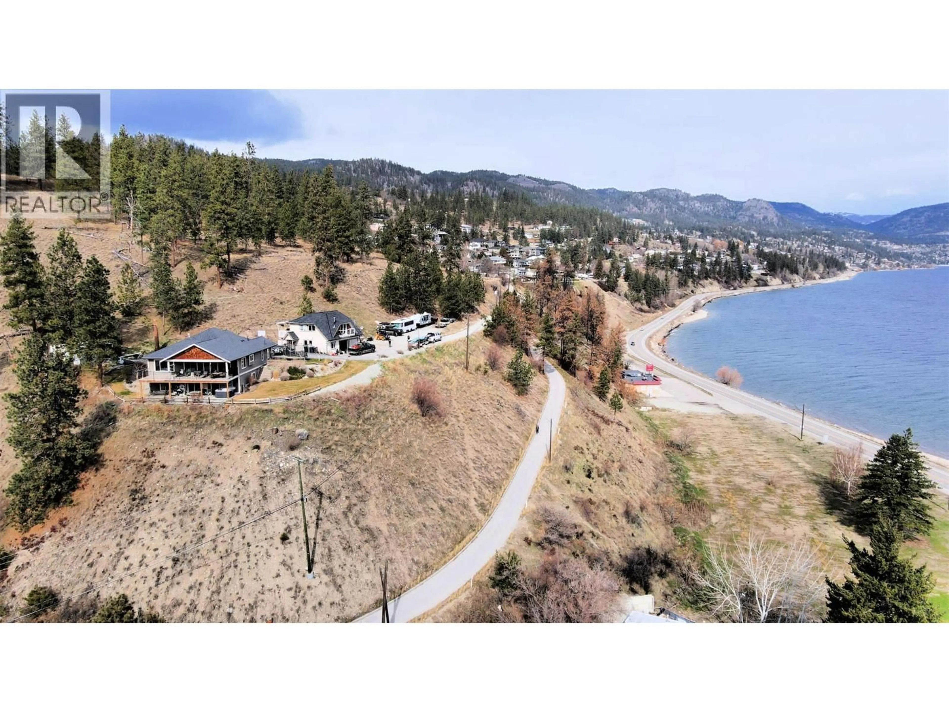 A pic from outside/outdoor area/front of a property/back of a property/a pic from drone, water/lake/river/ocean view for 32 - 6663 HWY 97 OTHER SOUTH, Peachland British Columbia V0H1X7