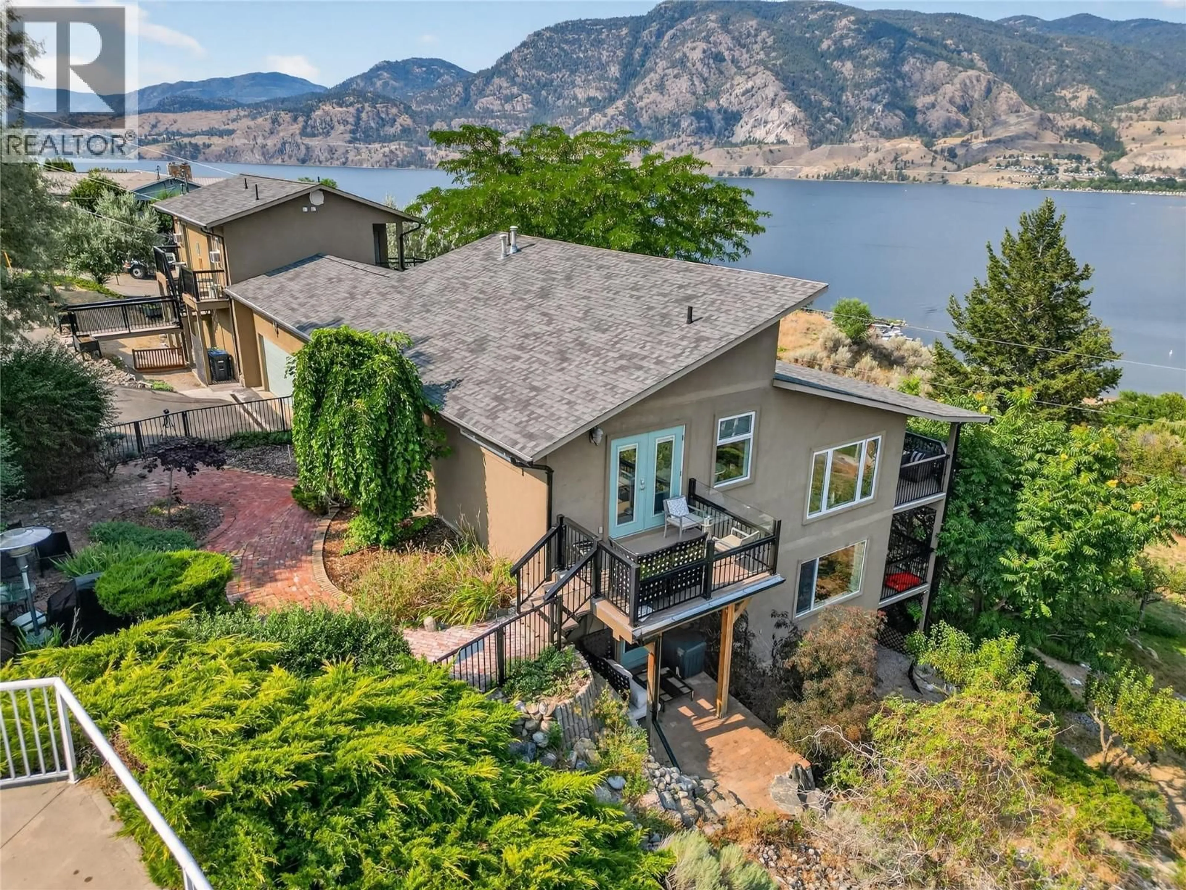 A pic from outside/outdoor area/front of a property/back of a property/a pic from drone, water/lake/river/ocean view for 102 SPRUCE PLACE, Penticton British Columbia V2A8V9