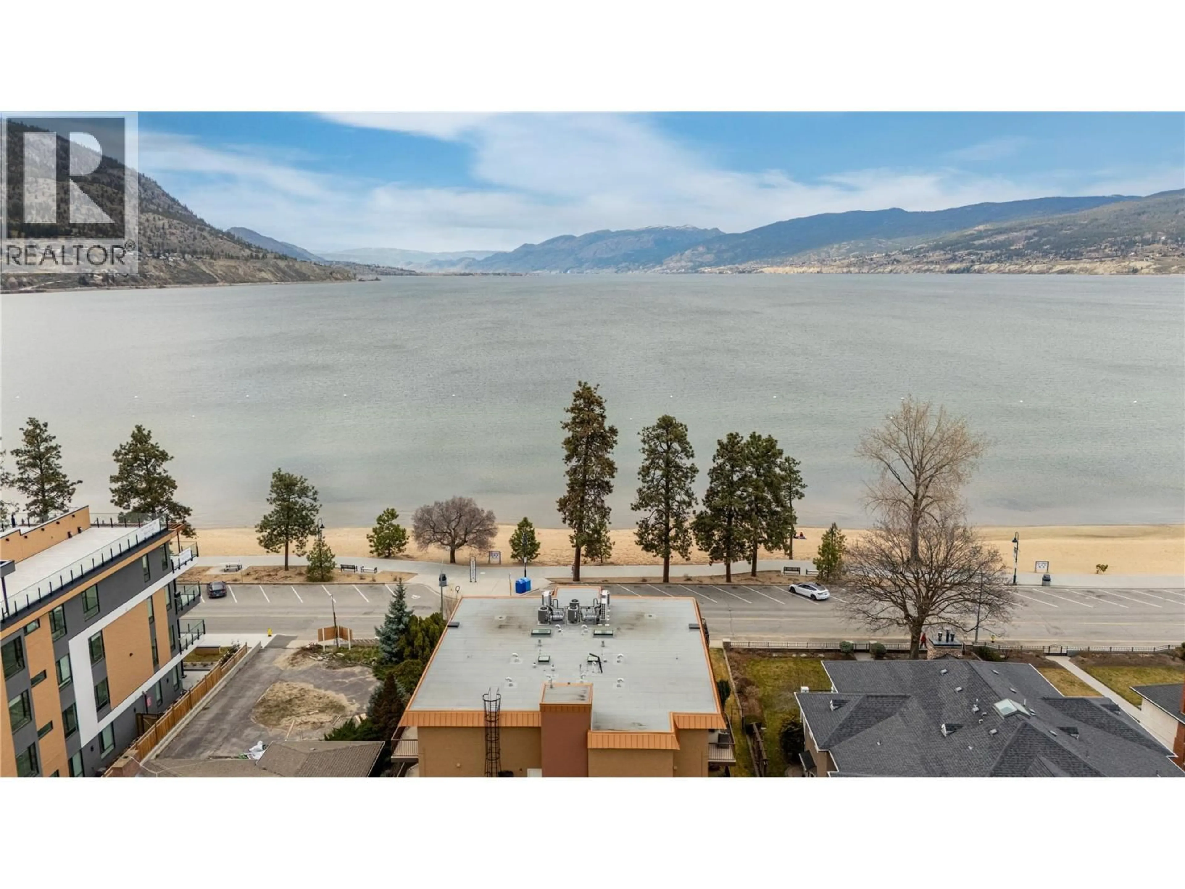 A pic from outside/outdoor area/front of a property/back of a property/a pic from drone, water/lake/river/ocean view for 203 - 578 LAKESHORE DRIVE, Penticton British Columbia V2A1B9