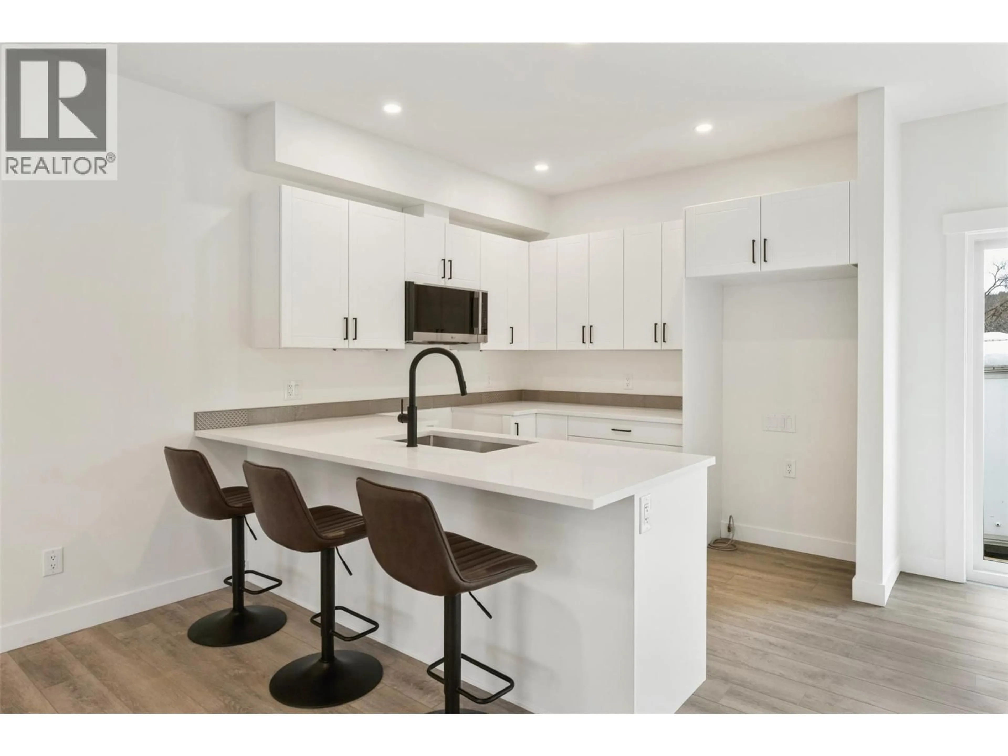 Open concept kitchen, unknown for 102 - 11815 GRANT AVENUE, Summerland British Columbia V0H1Z8
