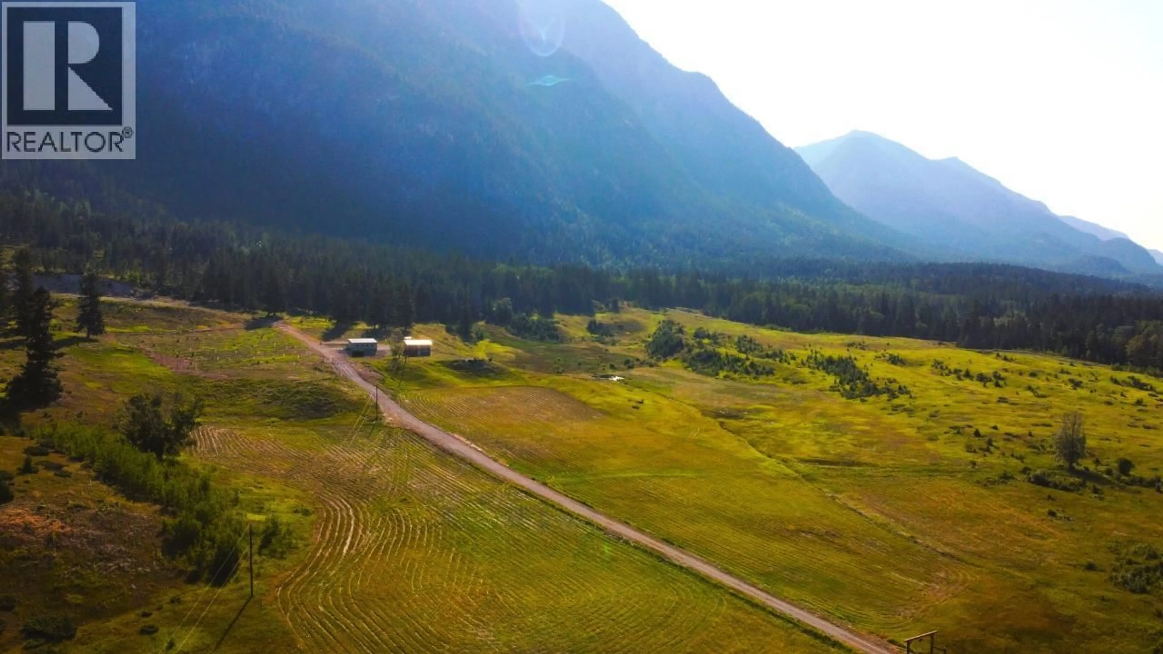 A pic from outside/outdoor area/front of a property/back of a property/a pic from drone, mountain view for 726 95 HIGHWAY, Spillimacheen British Columbia V0A1M0