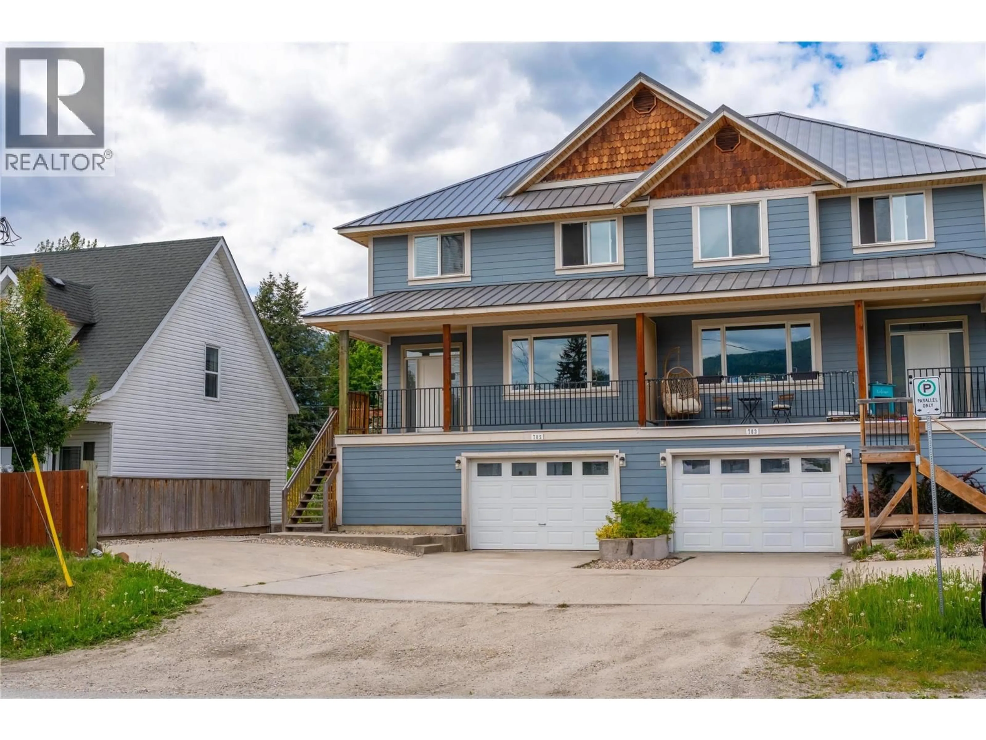 Home with vinyl exterior material, street for 705 CENTER STREET, Revelstoke British Columbia V0E2S0