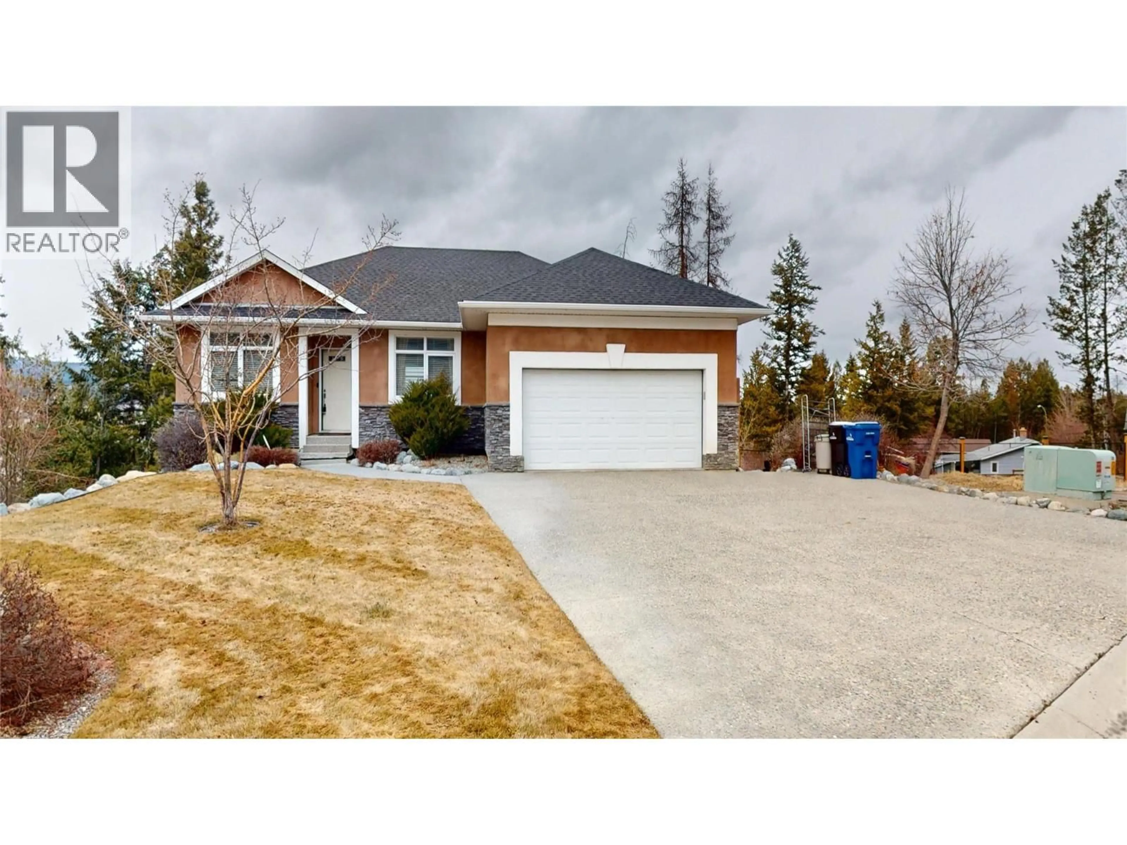 Home with brick exterior material, street for 1631 MT. PYRAMID CRESCENT, Cranbrook British Columbia V1C6K8