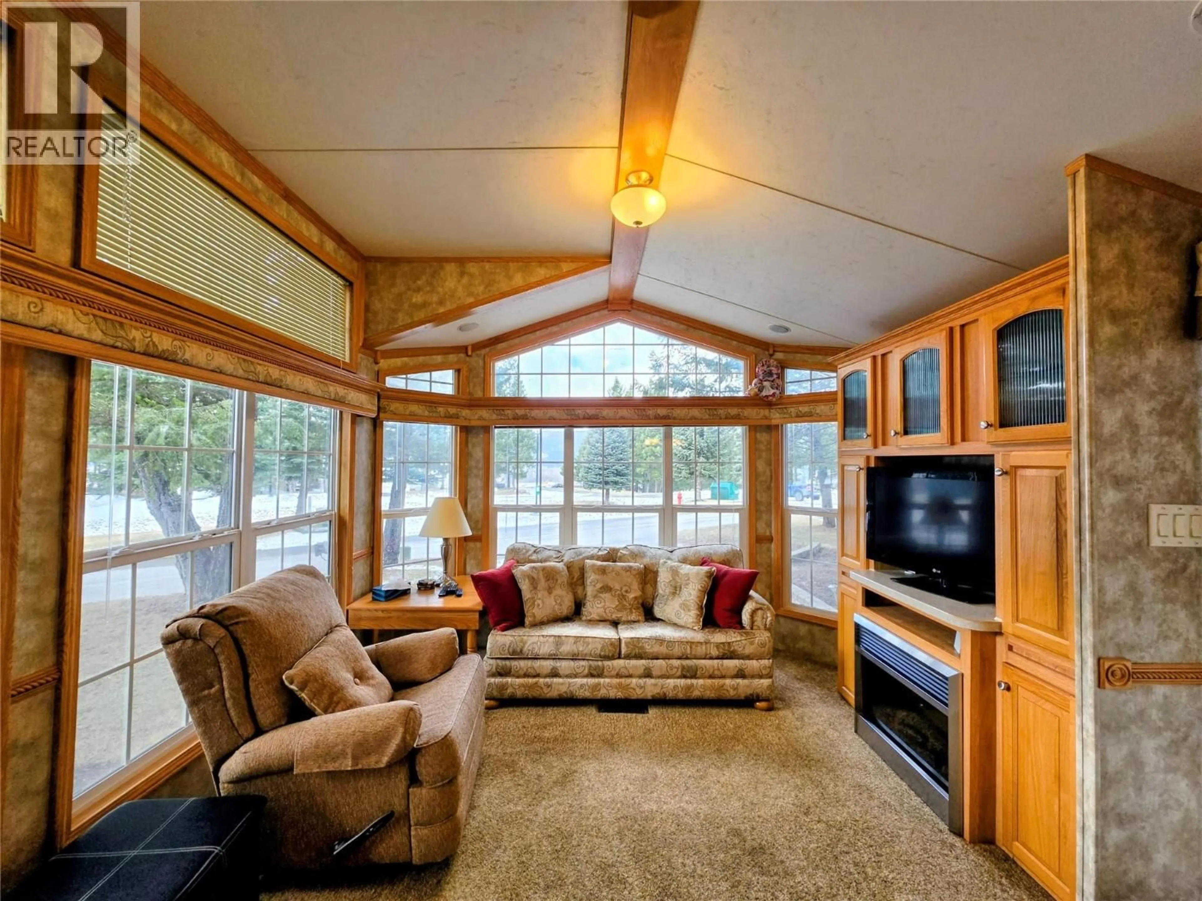 Living room with furniture, unknown for 4586 LYNX DRIVE, Radium Hot Springs British Columbia V0A1M0