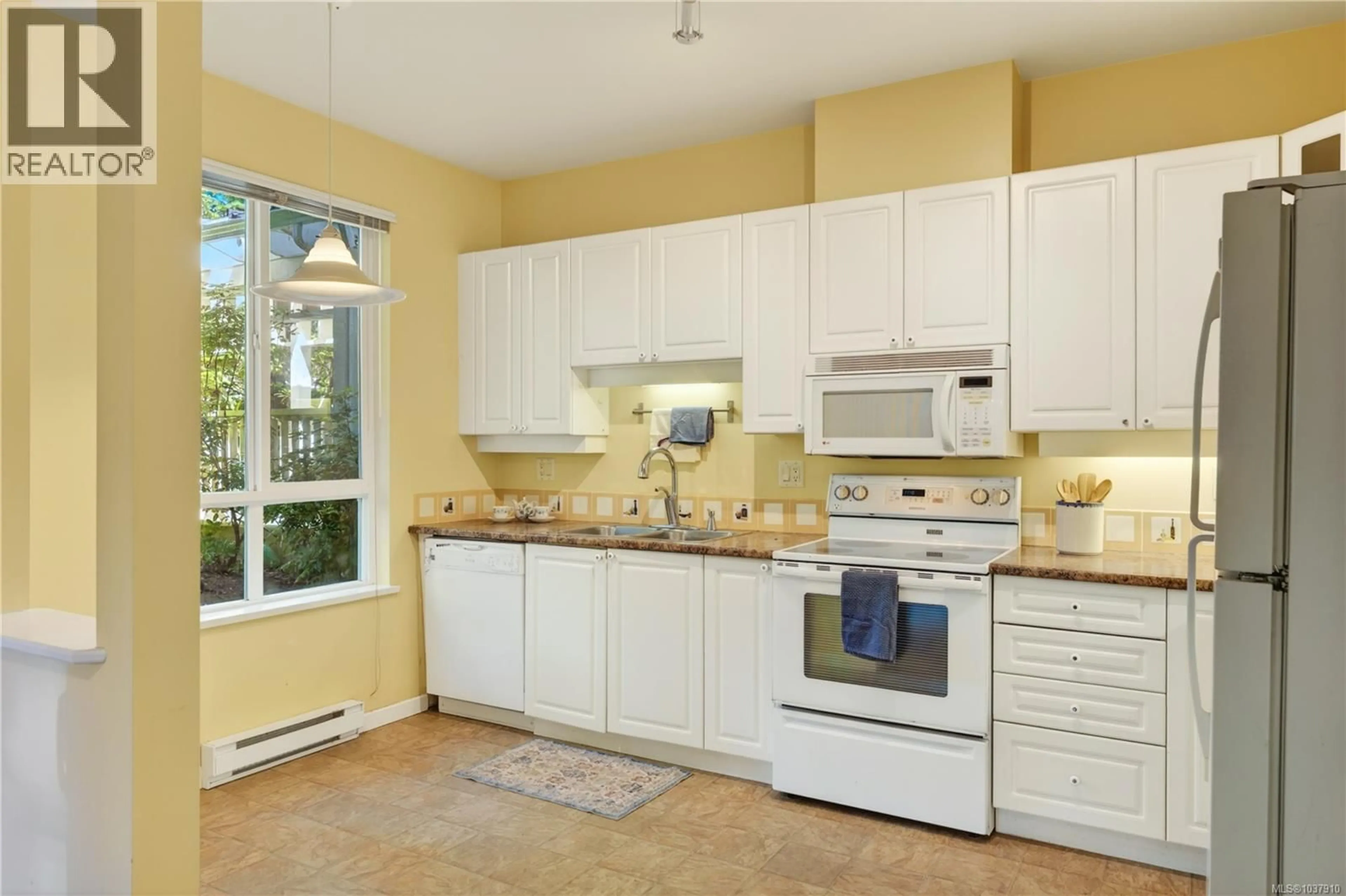Standard kitchen, ceramic/tile floor for 111 - 5685 EDGEWATER LANE, Nanaimo British Columbia V9T6K3
