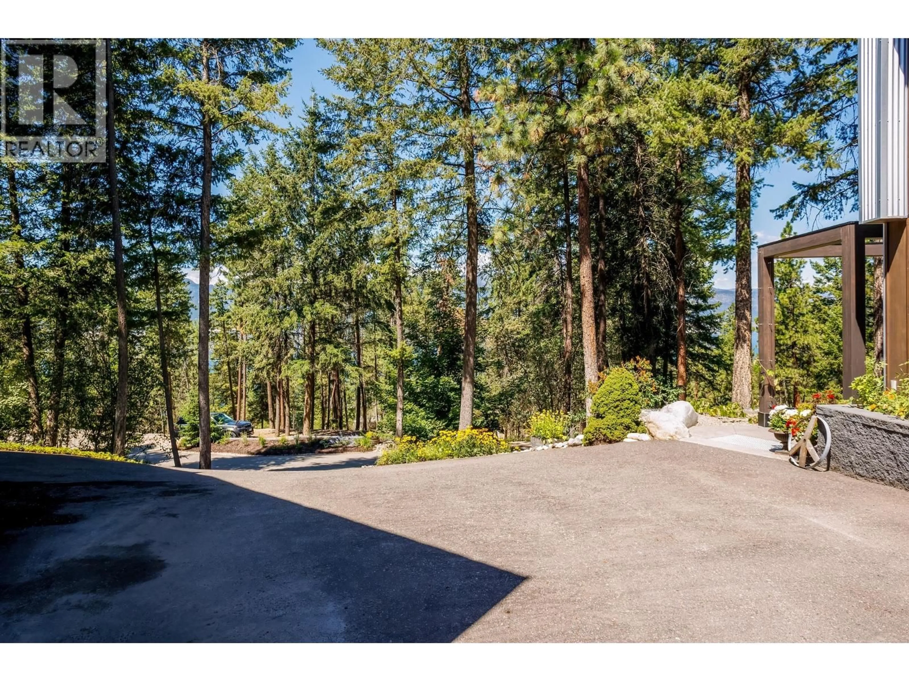 A pic from outside/outdoor area/front of a property/back of a property/a pic from drone, forest/trees view for 16355 BARKLEY ROAD, Lake Country British Columbia V4V1B4