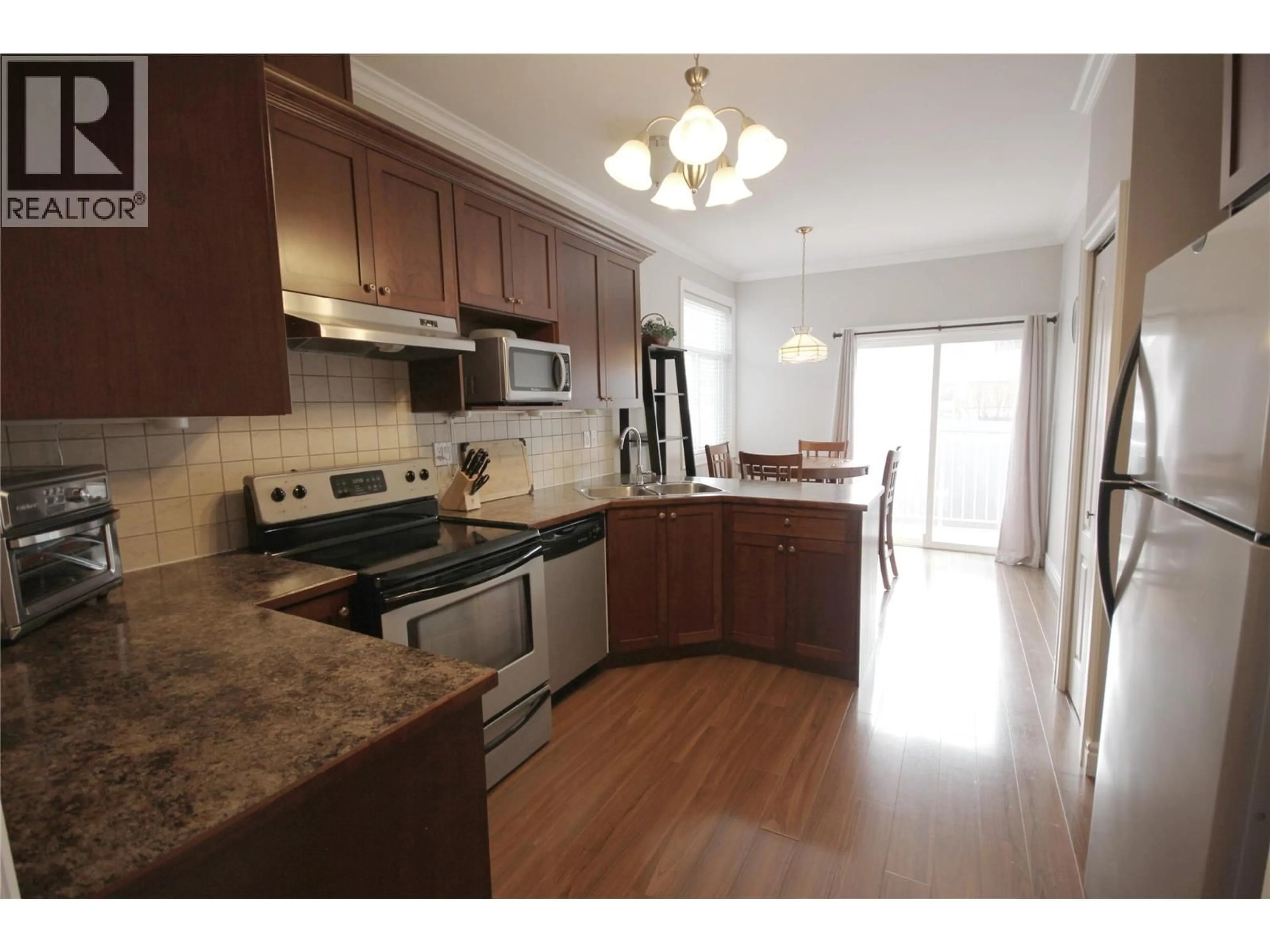 Open concept kitchen, unknown for 101 - 3011 SOUTH MAIN STREET, Penticton British Columbia V2A5J7