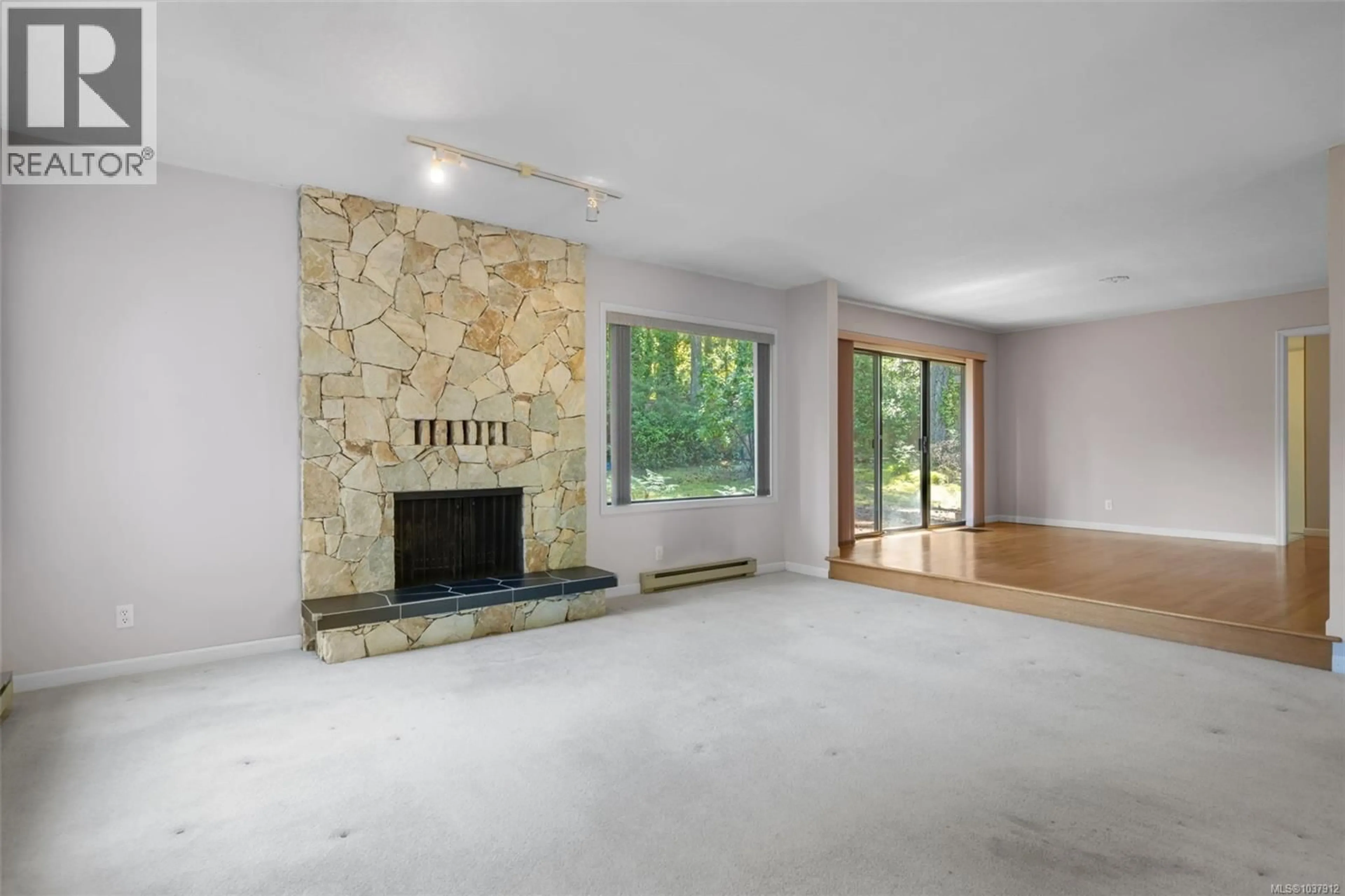Living room with furniture, unknown for 4489 COTTONTREE LANE, Saanich British Columbia V8X4H7