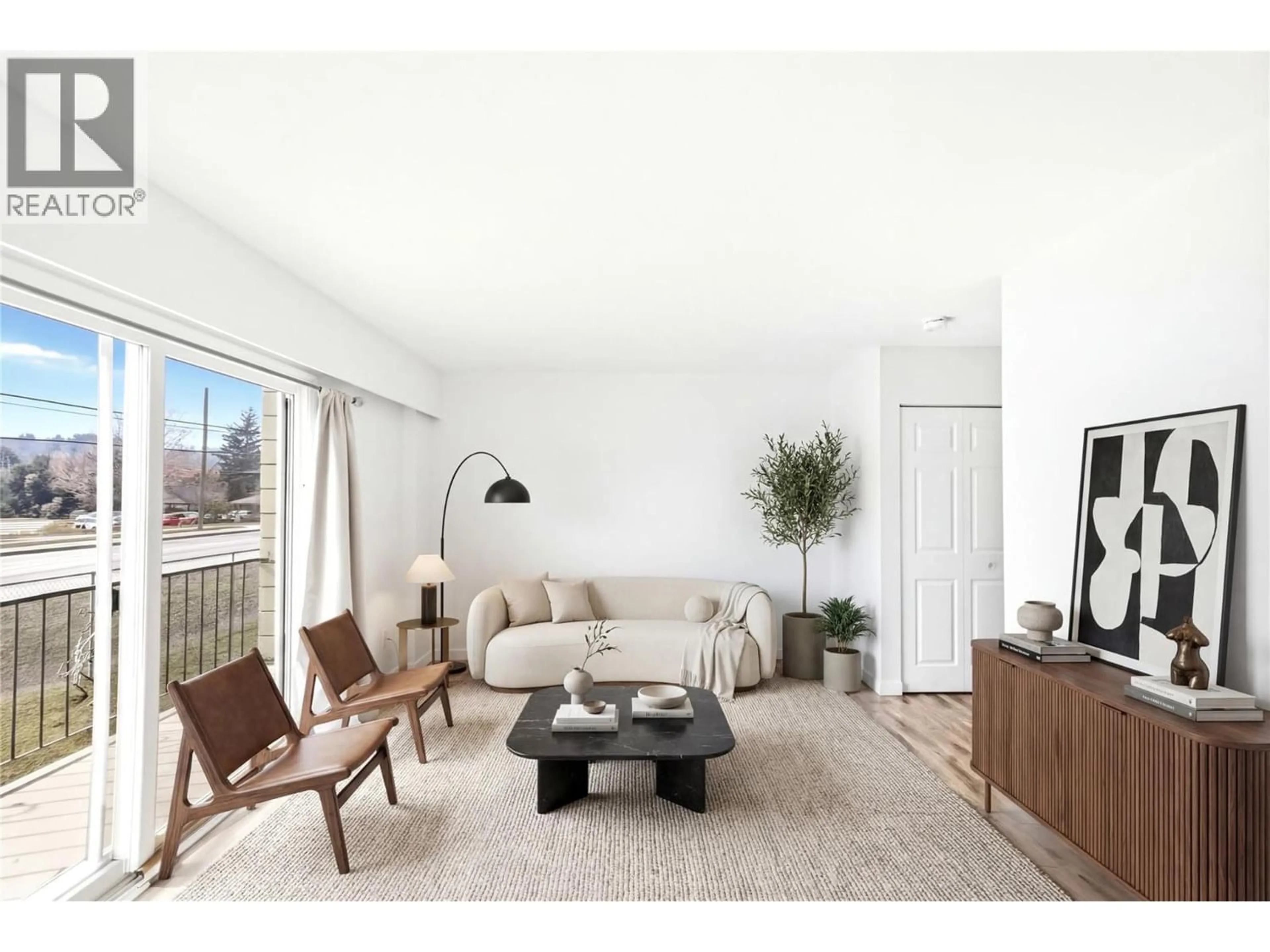 Living room with furniture, wood/laminate floor for 5 - 1946 TRANQUILLE ROAD, Kamloops British Columbia V2B3M5