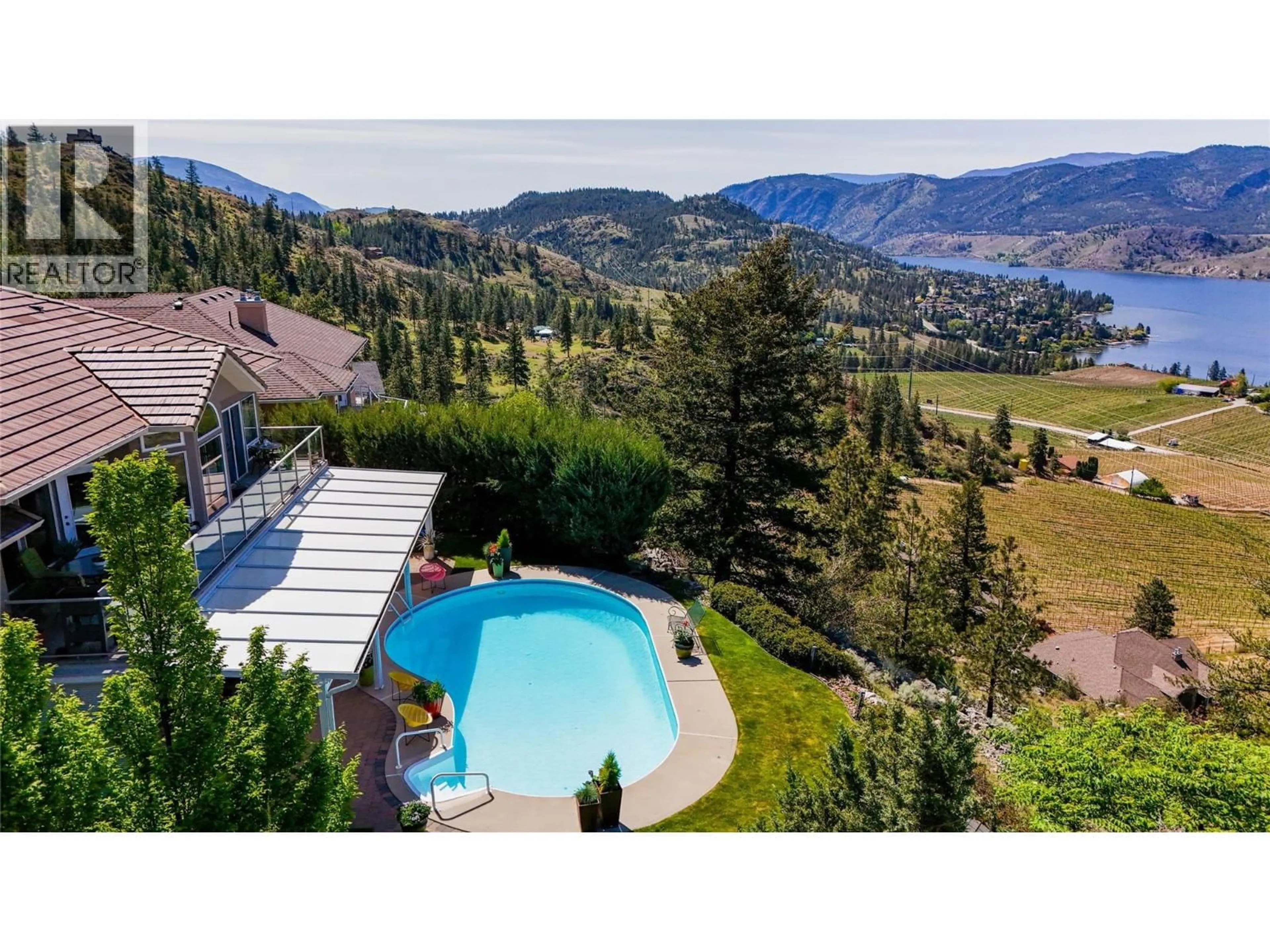 A pic from outside/outdoor area/front of a property/back of a property/a pic from drone, mountain view for 153 APPLE ROAD, Okanagan Falls British Columbia V0H1R3