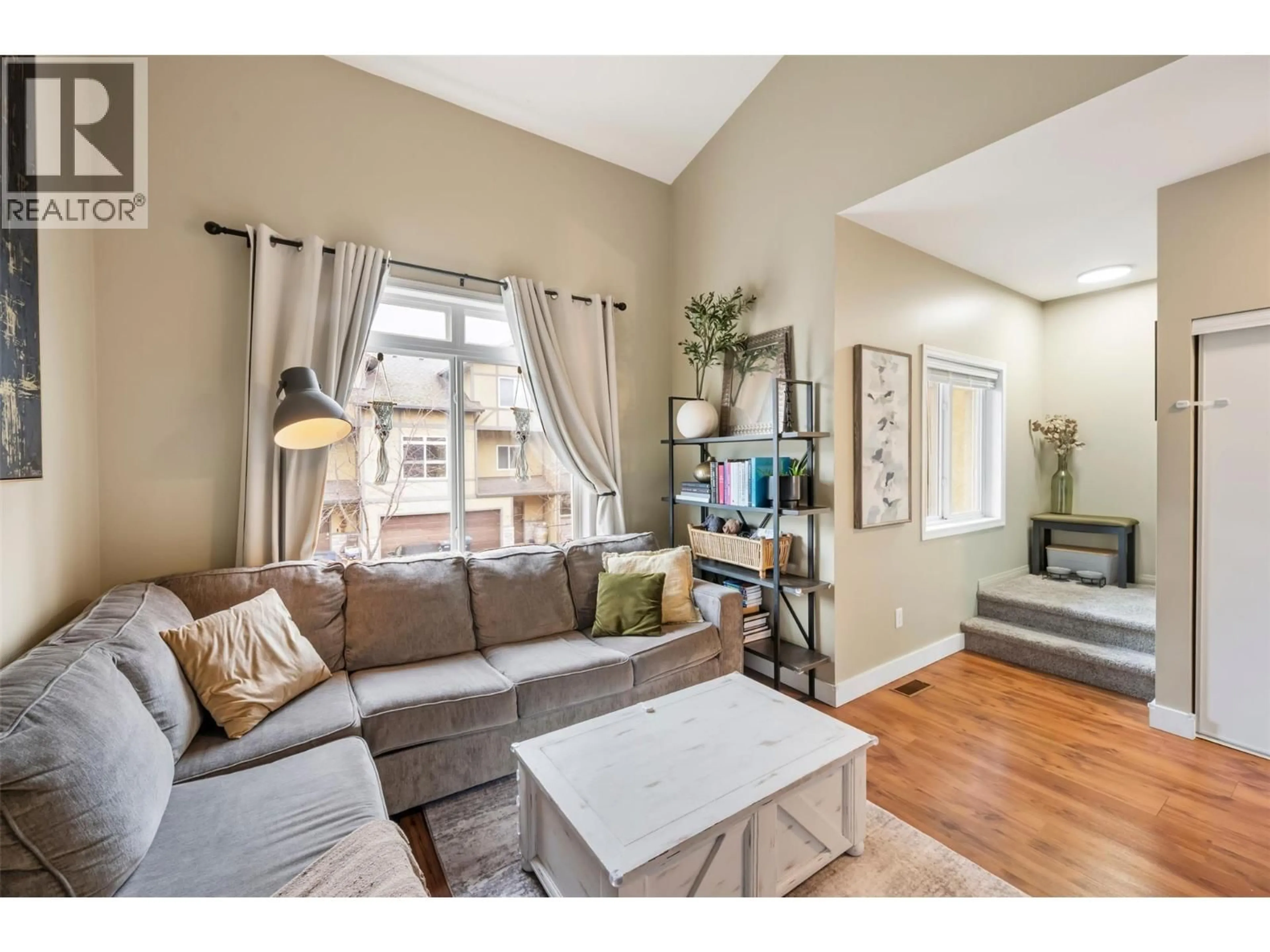 Living room with furniture, wood/laminate floor for 127 - 48 GALT AVENUE, Penticton British Columbia V2A9C3