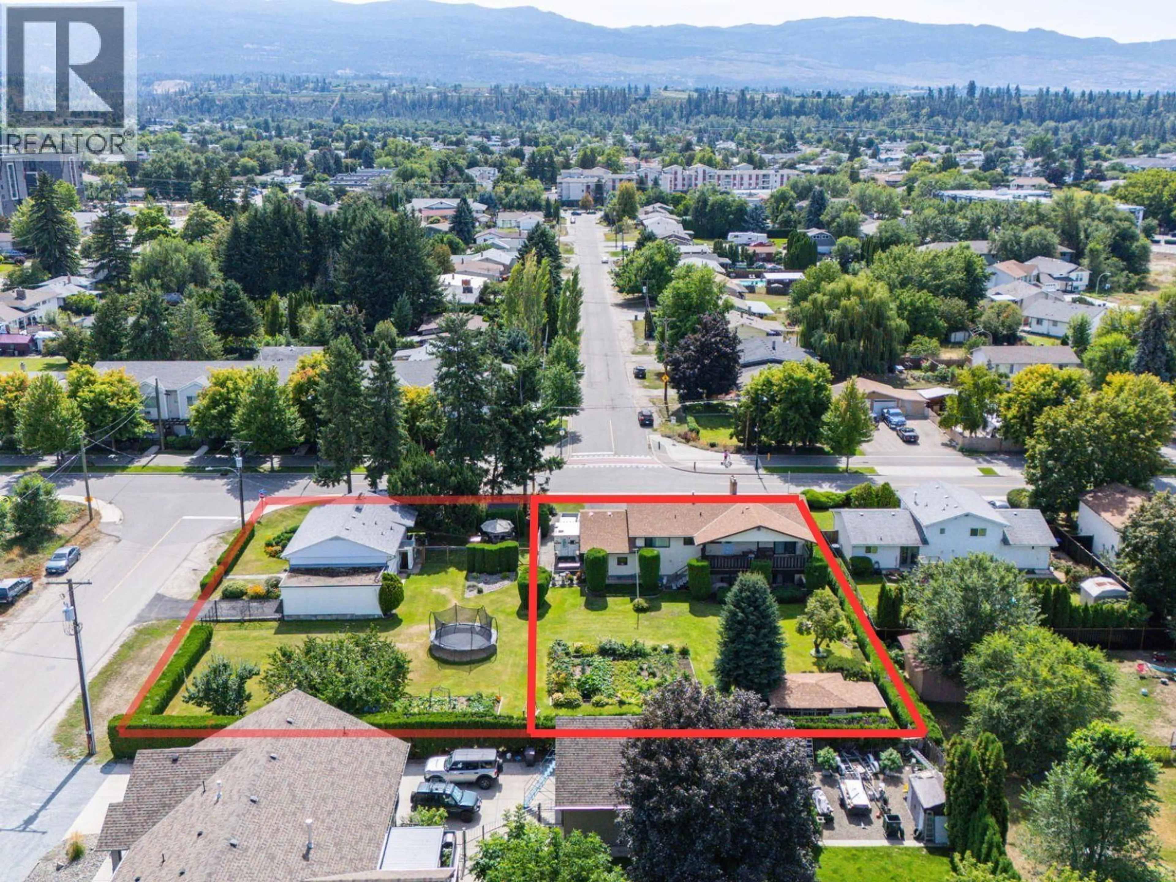 A pic from outside/outdoor area/front of a property/back of a property/a pic from drone, mountain view for 1090 HOUGHTON ROAD, Kelowna British Columbia V1X6G8