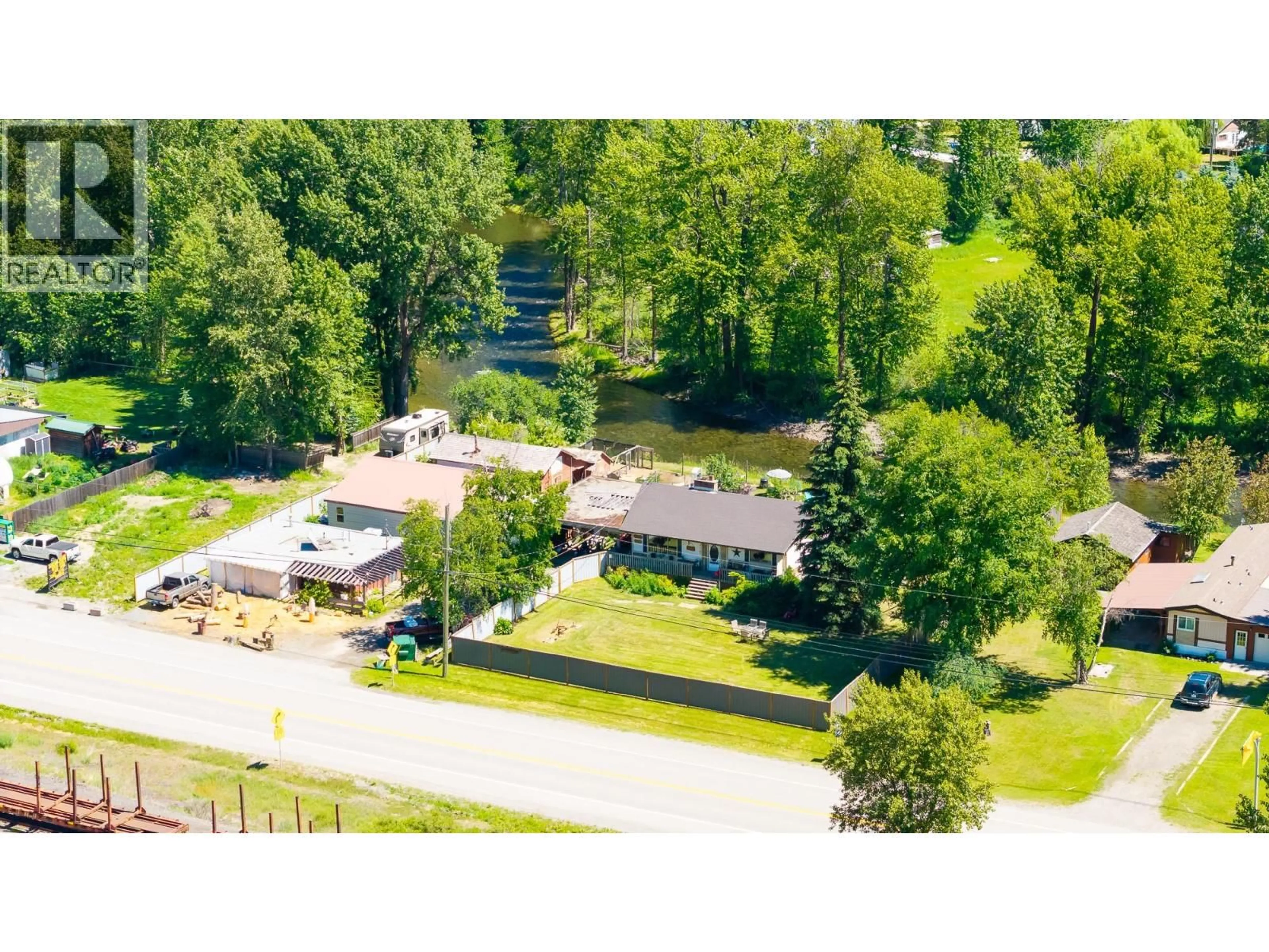 A pic from outside/outdoor area/front of a property/back of a property/a pic from drone, unknown for 9005 3 & 95 HIGHWAY, Yahk British Columbia V0B2P0