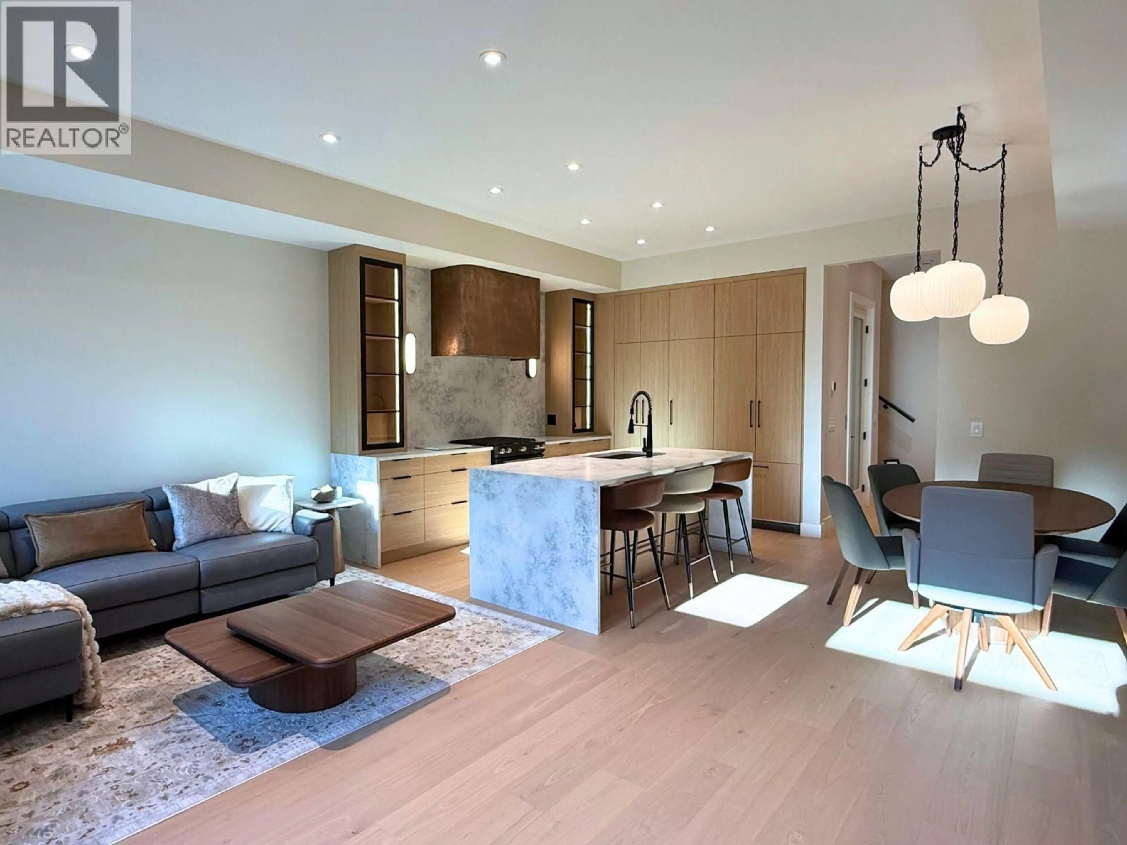 Open concept kitchen, wood/laminate floor for 4 - 781 MARTIN AVENUE, Kelowna British Columbia V1Y6V4