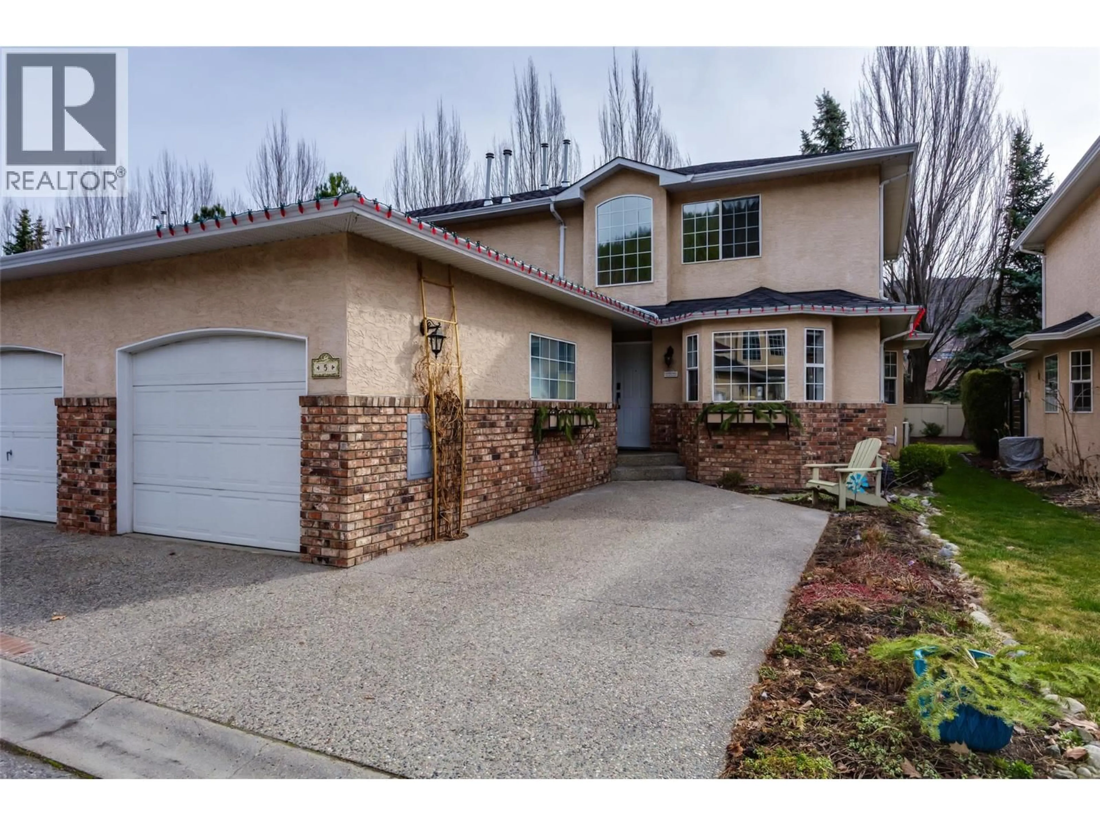 Home with brick exterior material, street for 5 - 527 YATES ROAD, Kelowna British Columbia V1V1Z5