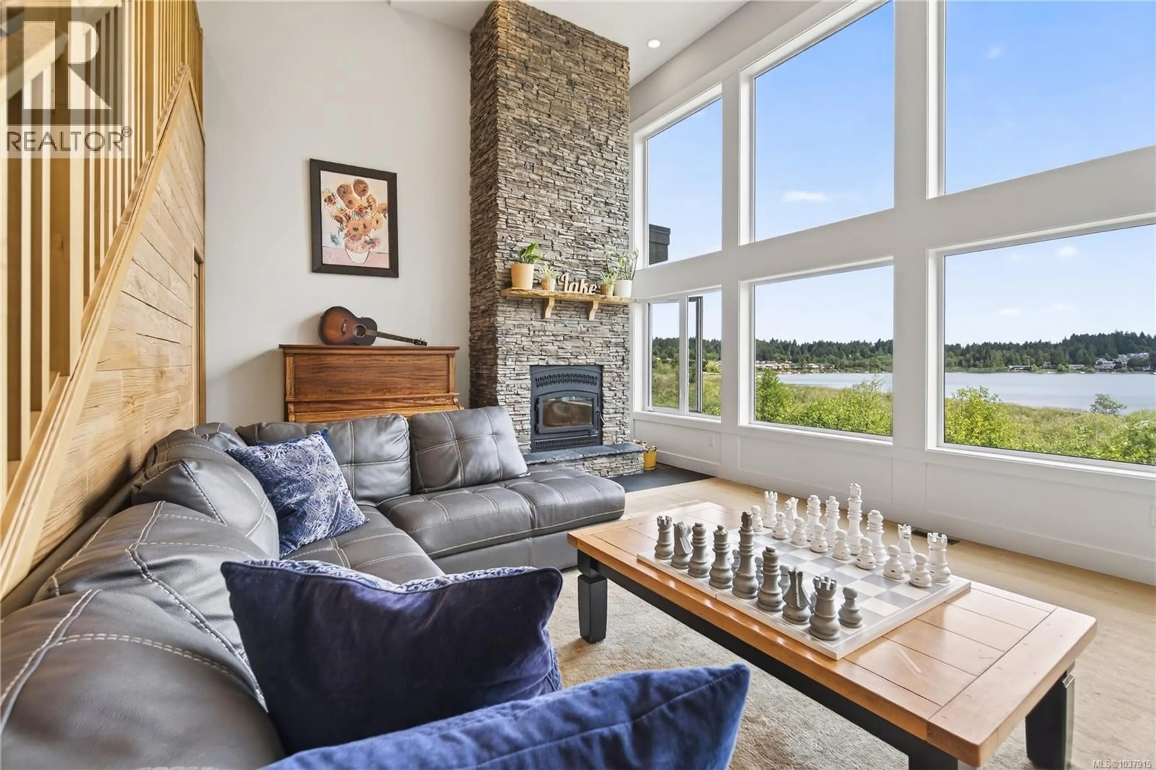Living room with furniture, ceramic/tile floor for 6499/6495 DOUMONT ROAD, Nanaimo British Columbia V9T6G7