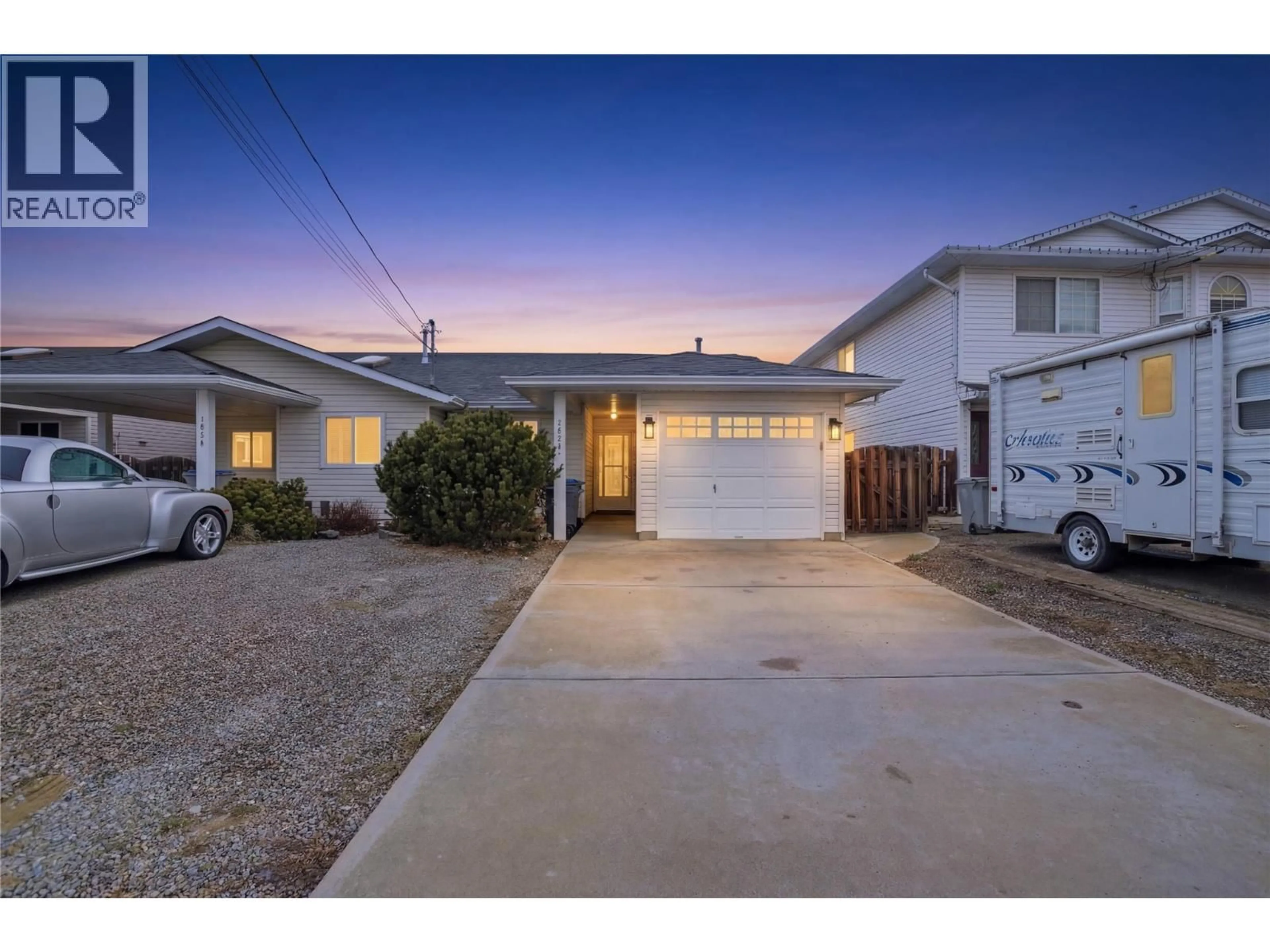 A pic from outside/outdoor area/front of a property/back of a property/a pic from drone, street for 1232 13TH STREET, Kamloops British Columbia V2B8K3