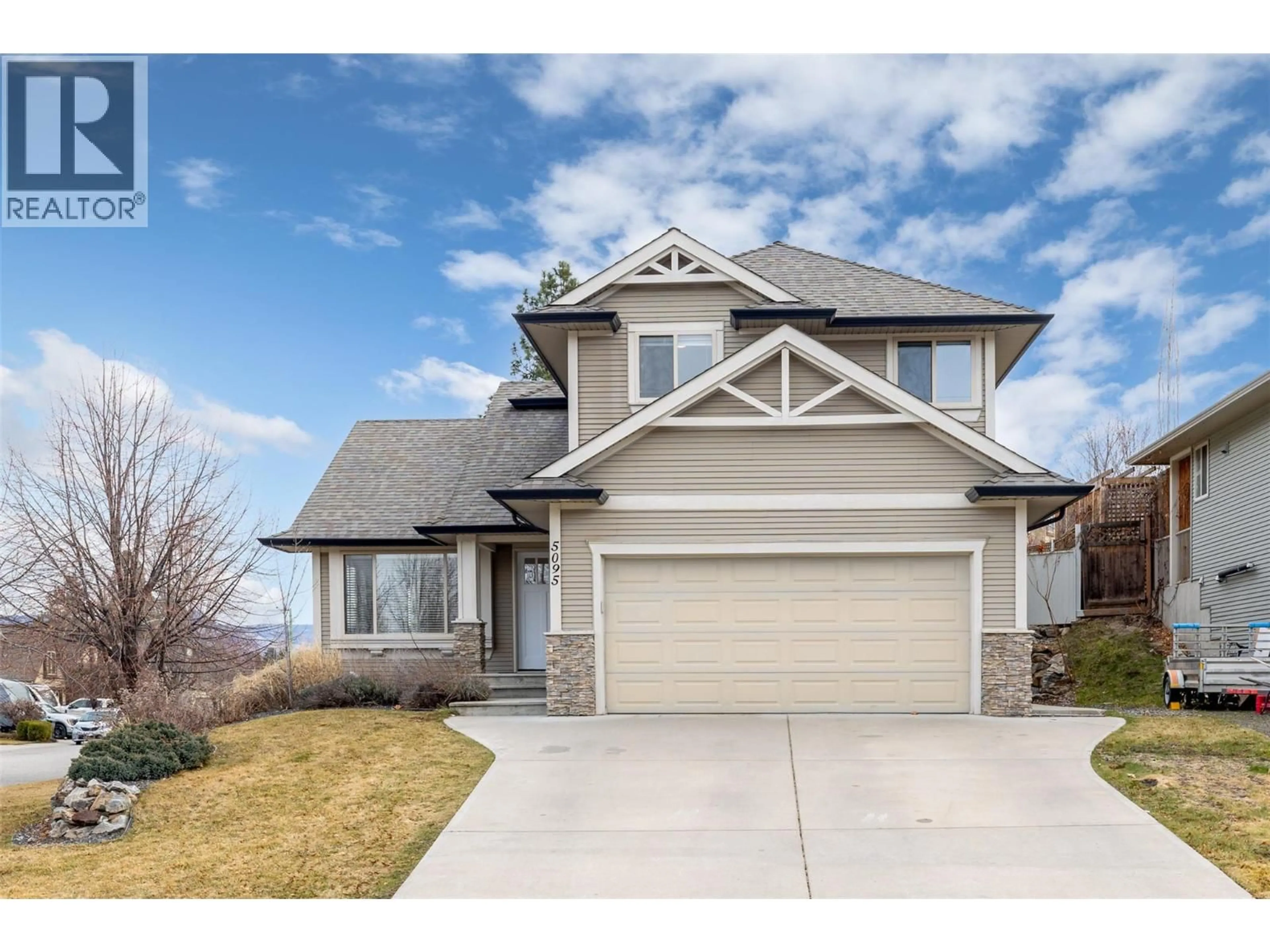 Home with vinyl exterior material, street for 5095 WINDSONG CRESCENT, Kelowna British Columbia V1W5B5