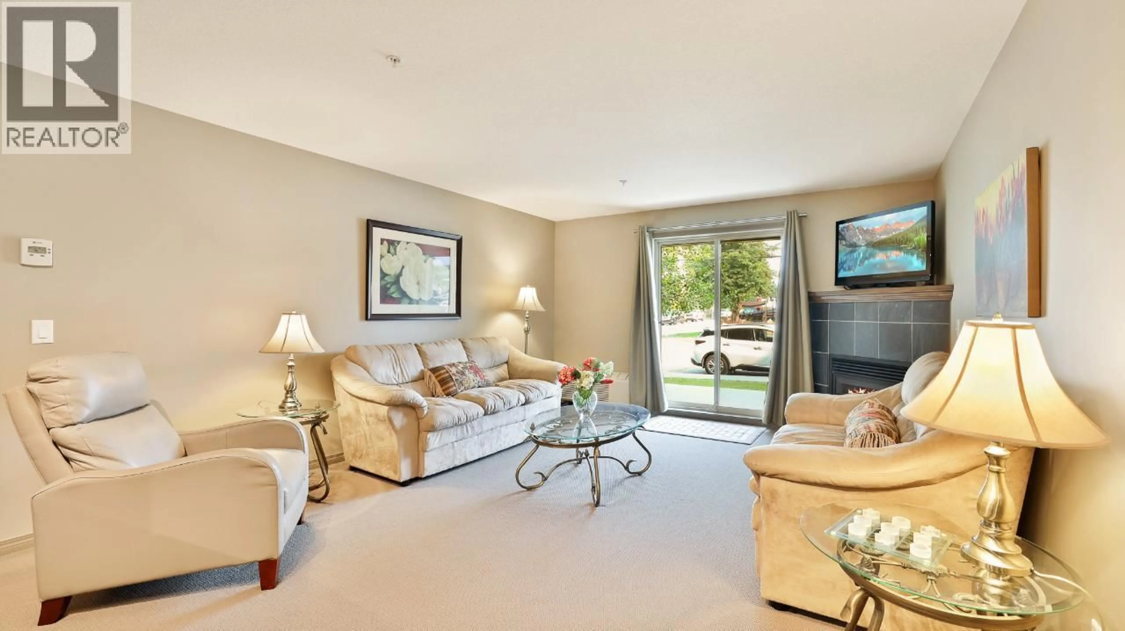 Living room with furniture, carpet floor for 107 - 4874 STANLEY STREET, Radium Hot Springs British Columbia V0A1M0