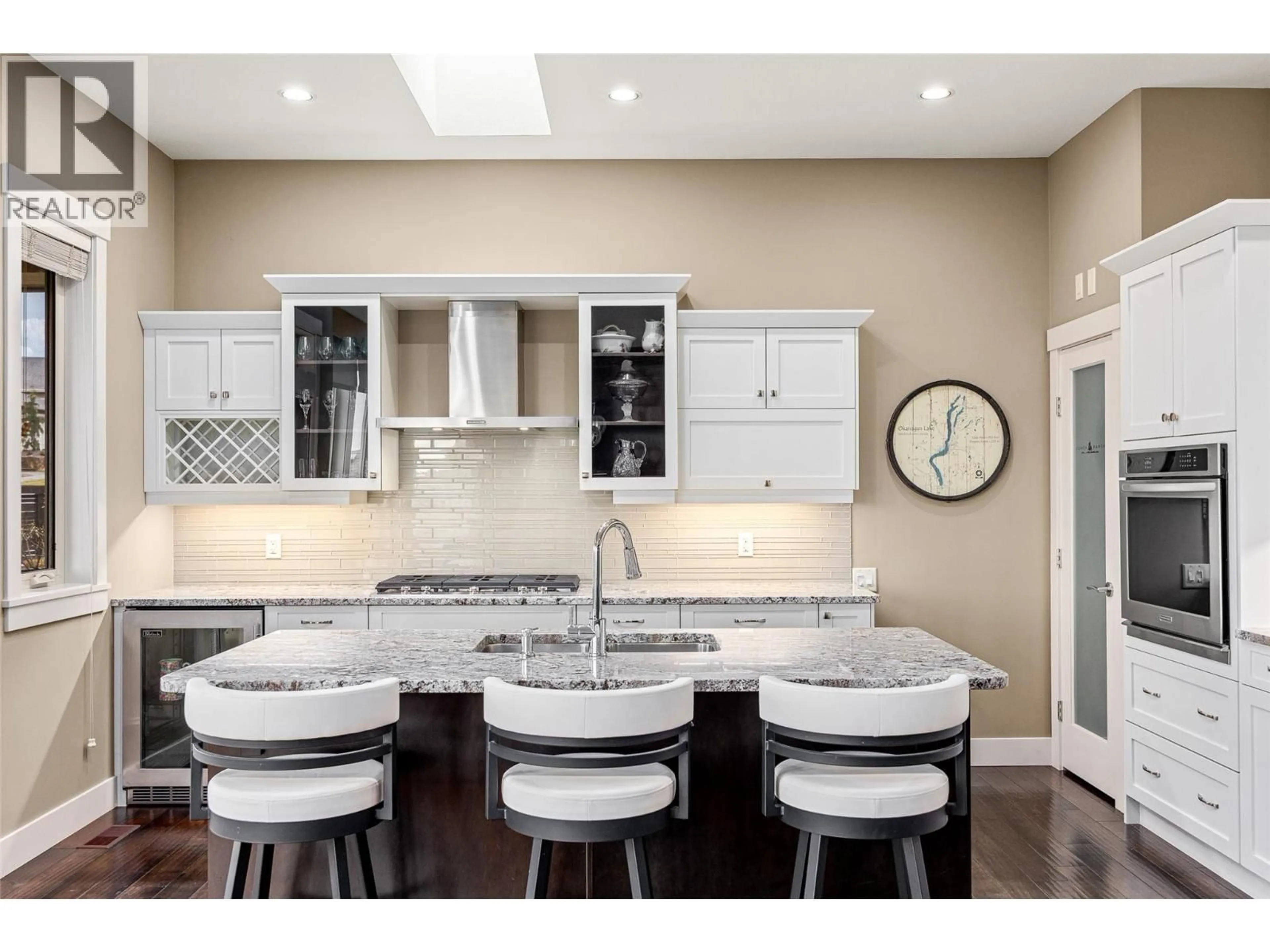 Contemporary kitchen, ceramic/tile floor for 1768 SPLIT RAIL PLACE, Kelowna British Columbia V1P1R1