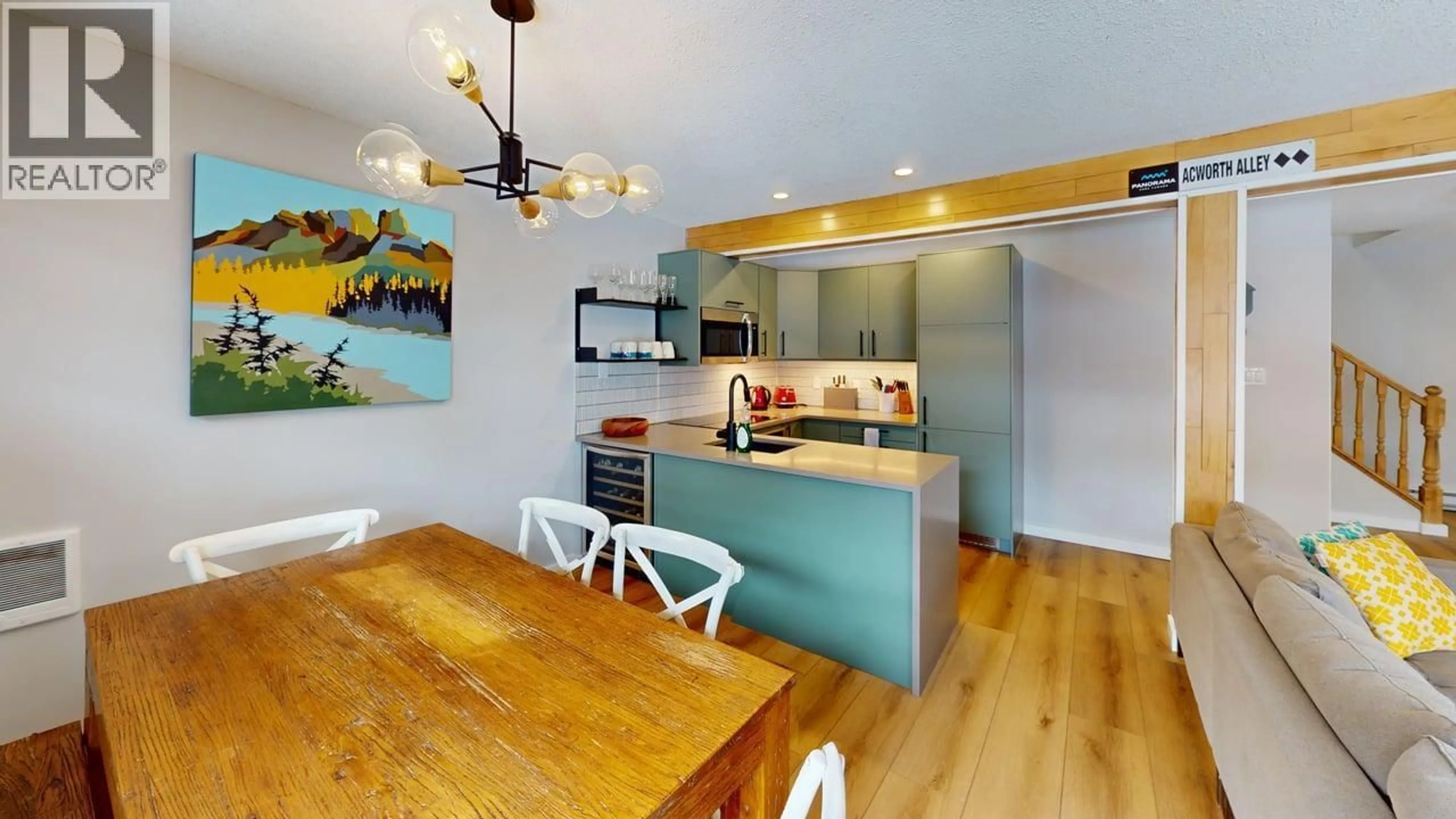 Open concept kitchen, wood/laminate floor for 317 - 2030 PANORAMA DRIVE, Panorama British Columbia V0A1T0