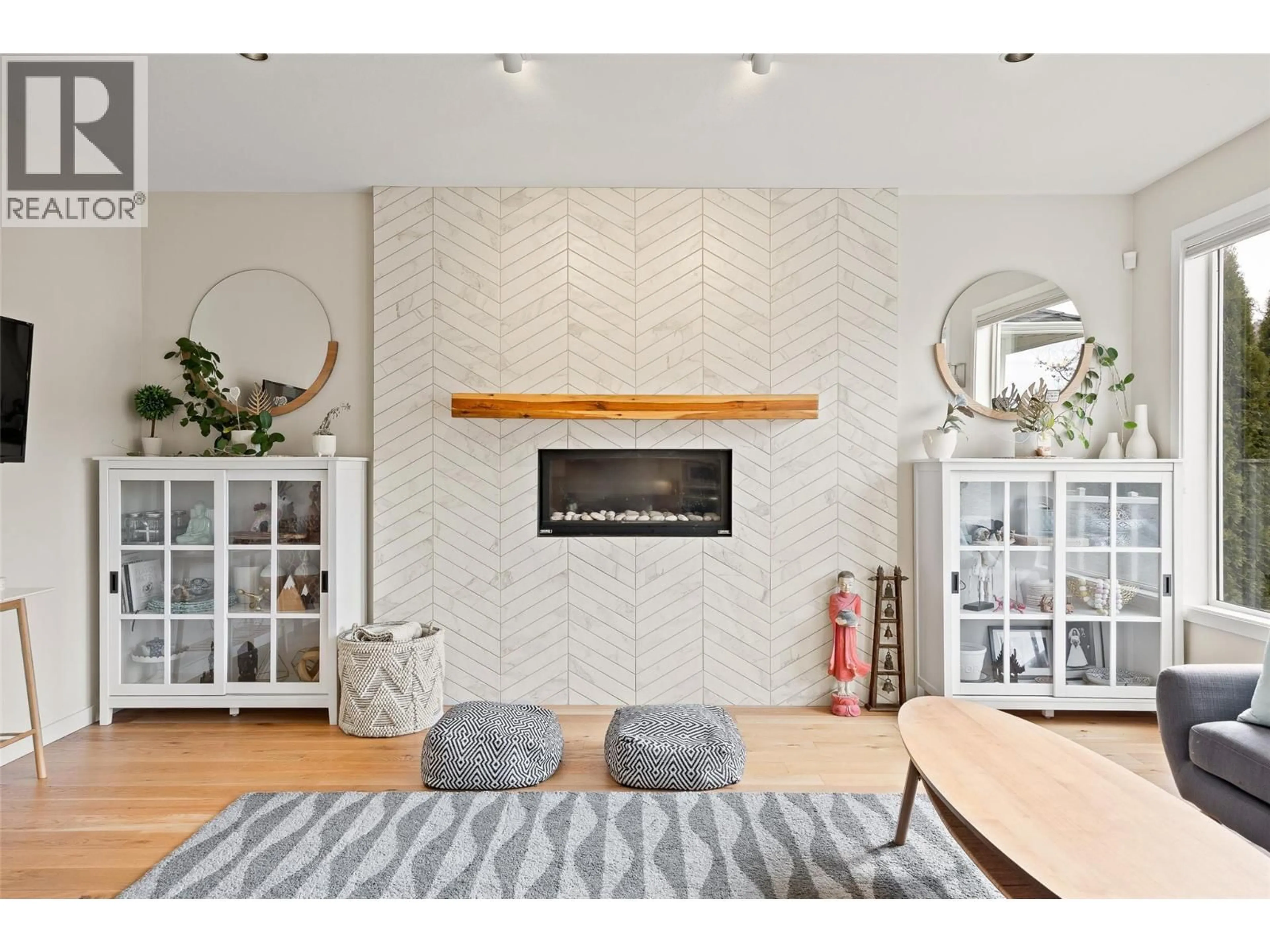 Living room with furniture, ceramic/tile floor for 641 PERIDOT PLACE, Kelowna British Columbia V1W5E7