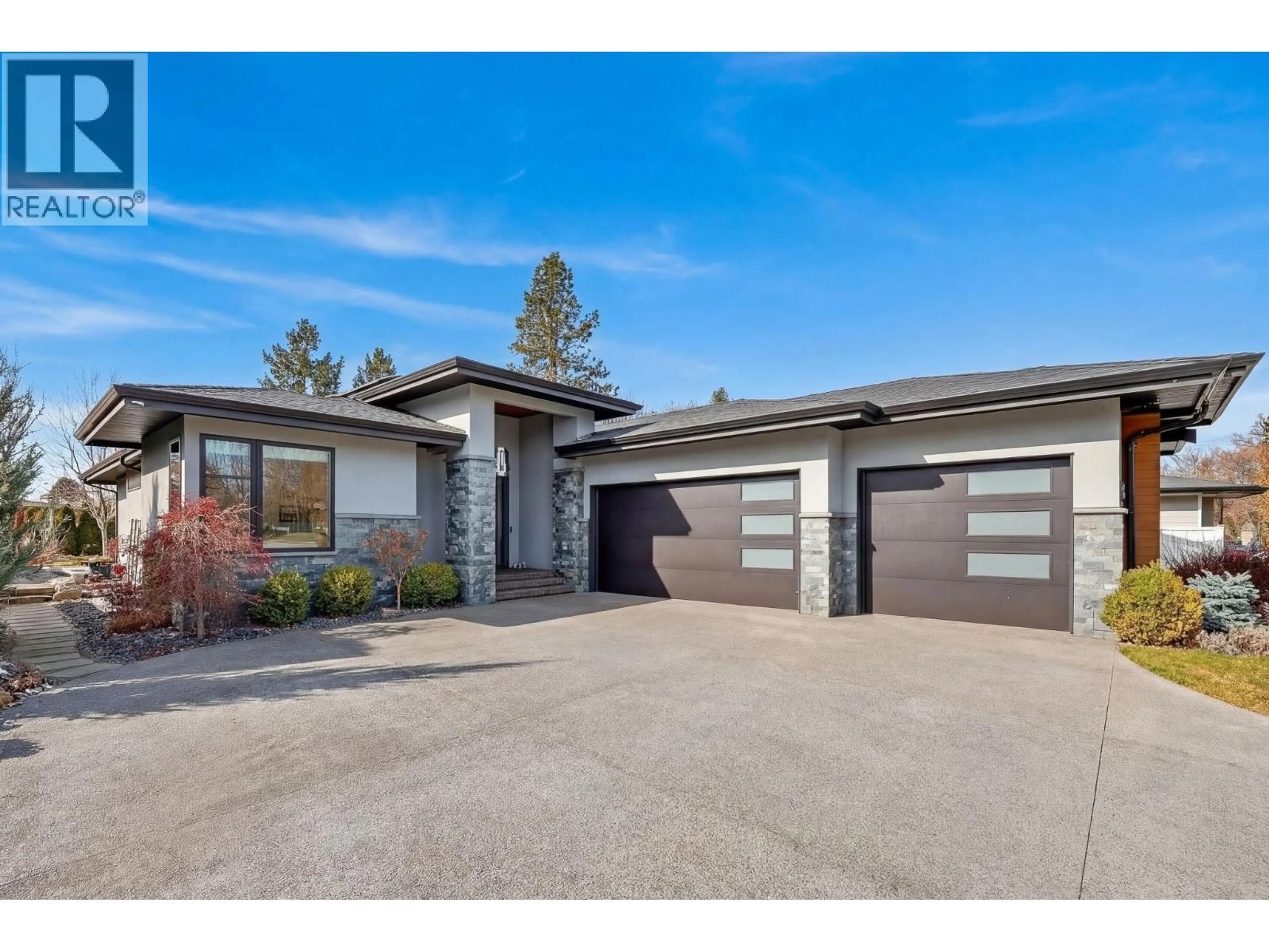 Home with brick exterior material, street for 4346 ULEY ROAD, Kelowna British Columbia V1W5M7