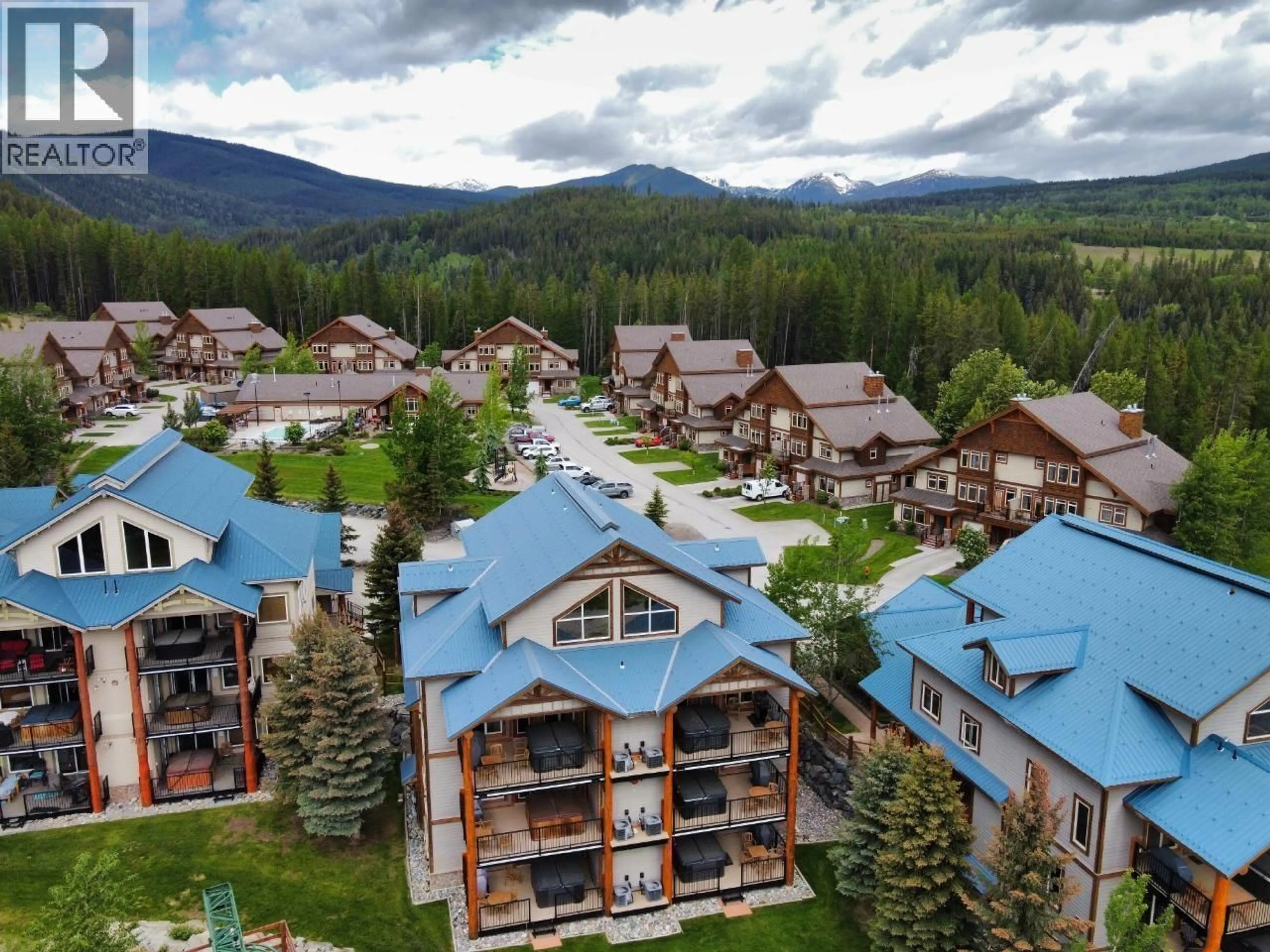 A pic from outside/outdoor area/front of a property/back of a property/a pic from drone, mountain view for D2-B - 1351 GERRY SORENSEN WAY, Kimberley British Columbia V1A2Y4