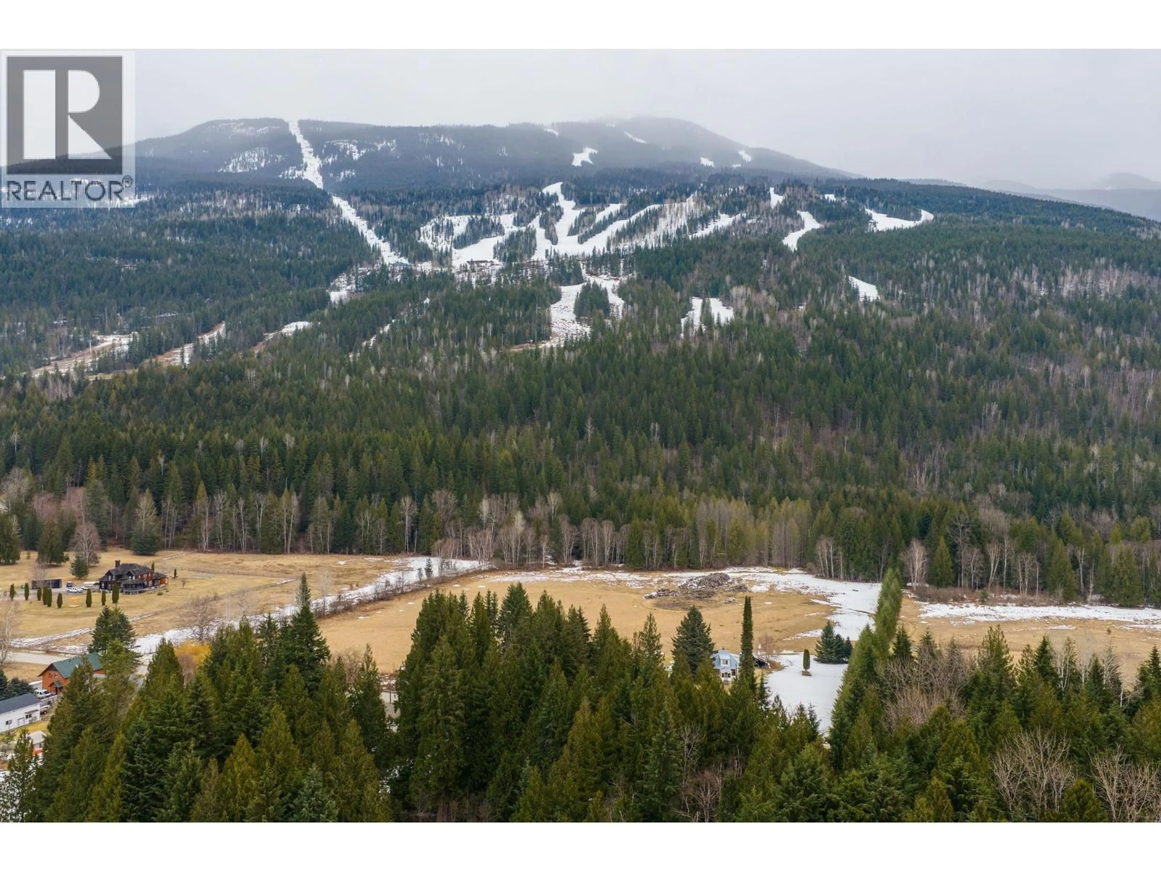 A pic from outside/outdoor area/front of a property/back of a property/a pic from drone, mountain view for 3463 CATHERWOOD ROAD, Revelstoke British Columbia V0E2S1