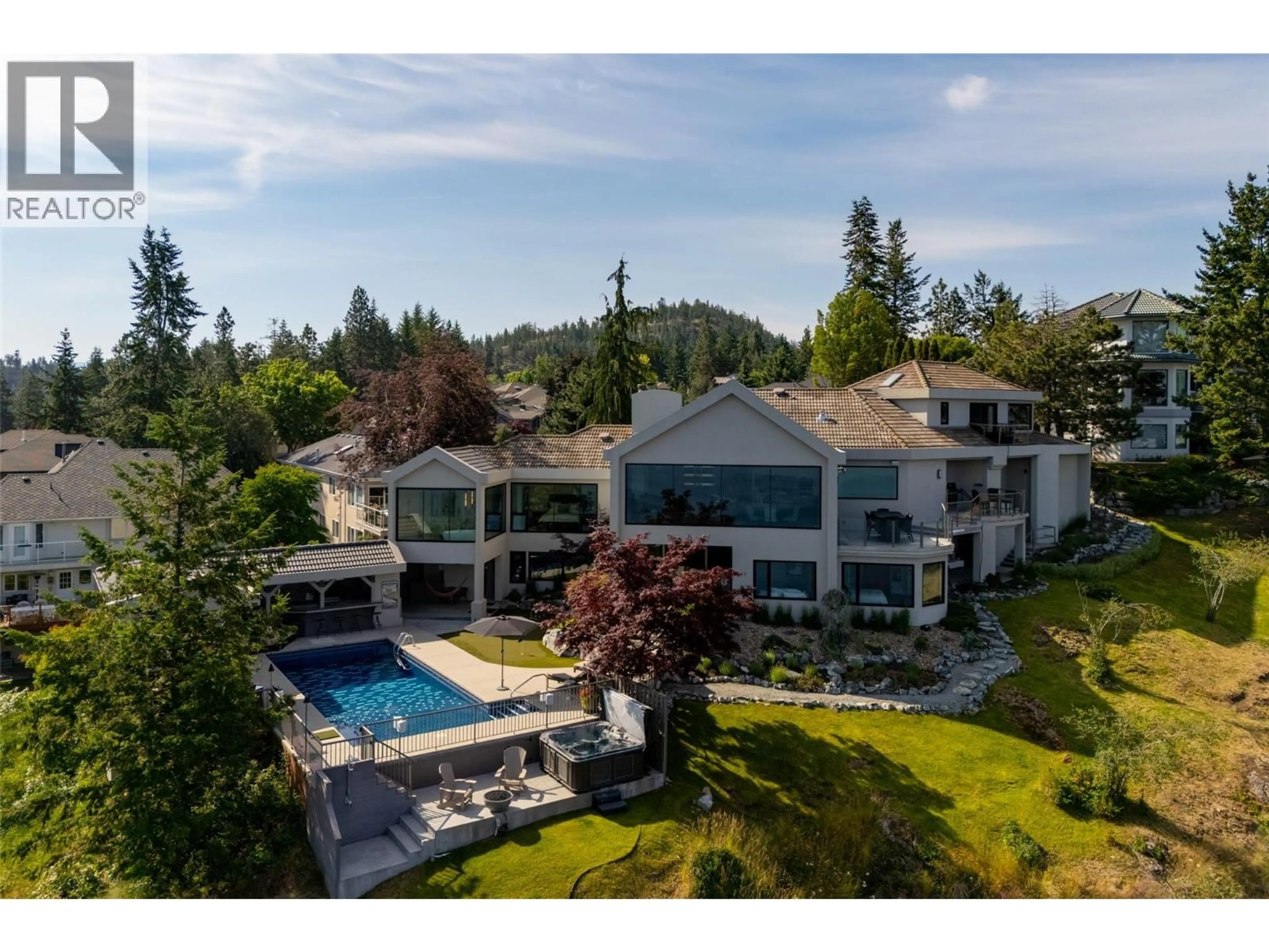 A pic from outside/outdoor area/front of a property/back of a property/a pic from drone, unknown for 228 CALIBURN COURT, Kelowna British Columbia V1V1N2
