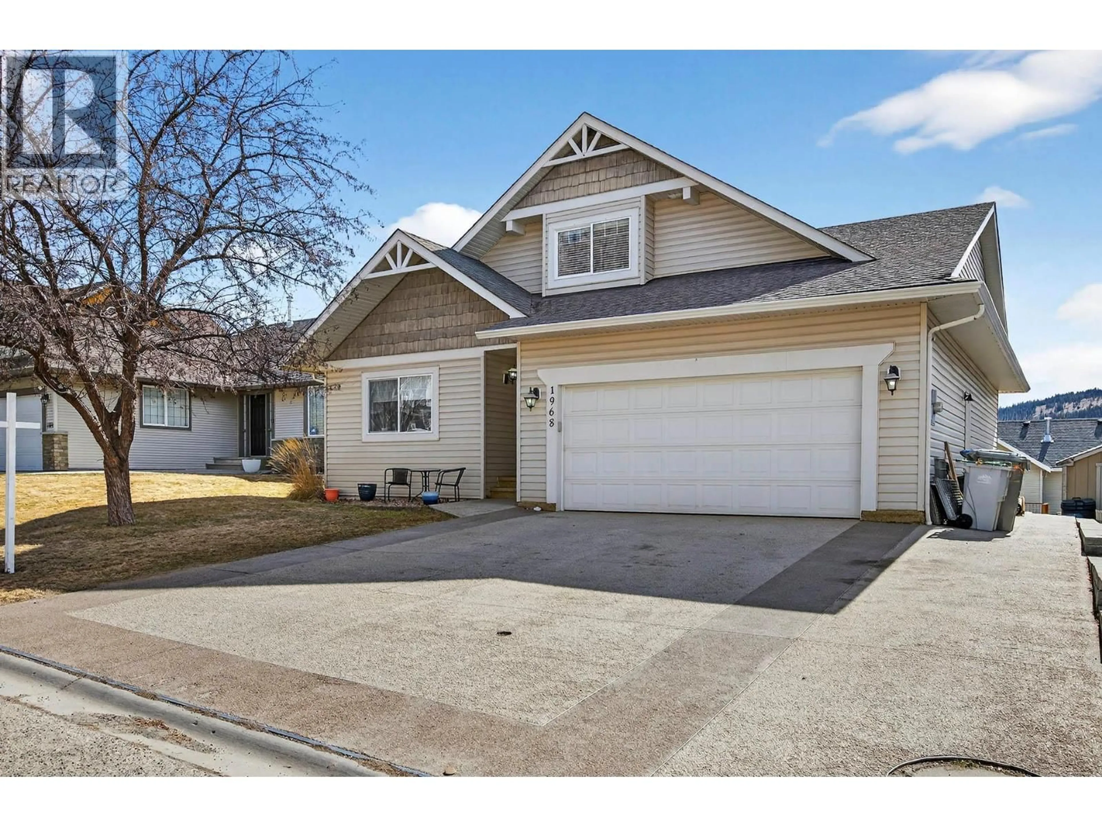 Home with vinyl exterior material, street for 1968 SASKATOON PLACE, Kamloops British Columbia V2E2T1